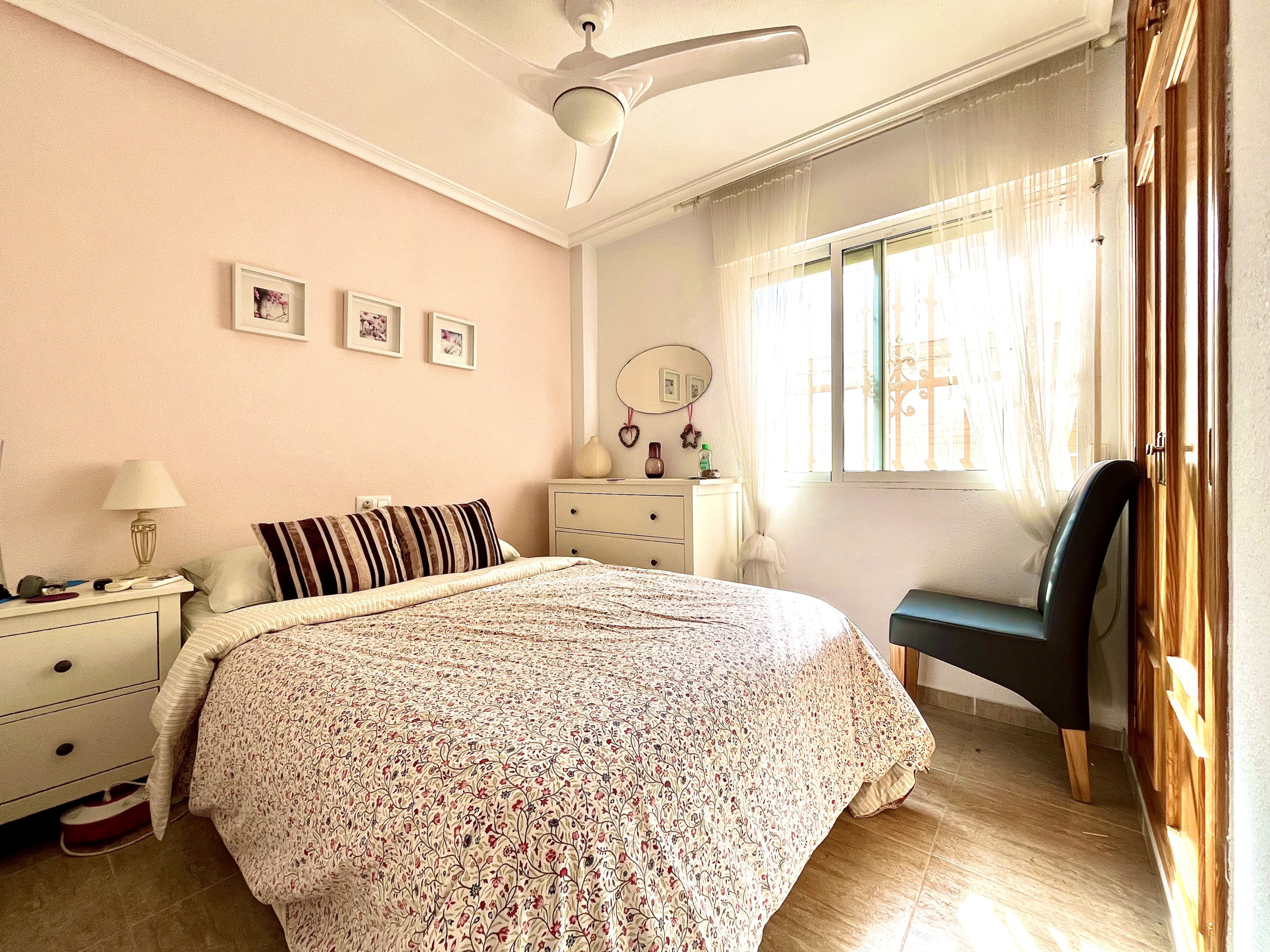 Bright double bedroom with air conditioning in Los Alcázares house by Levante Properties.