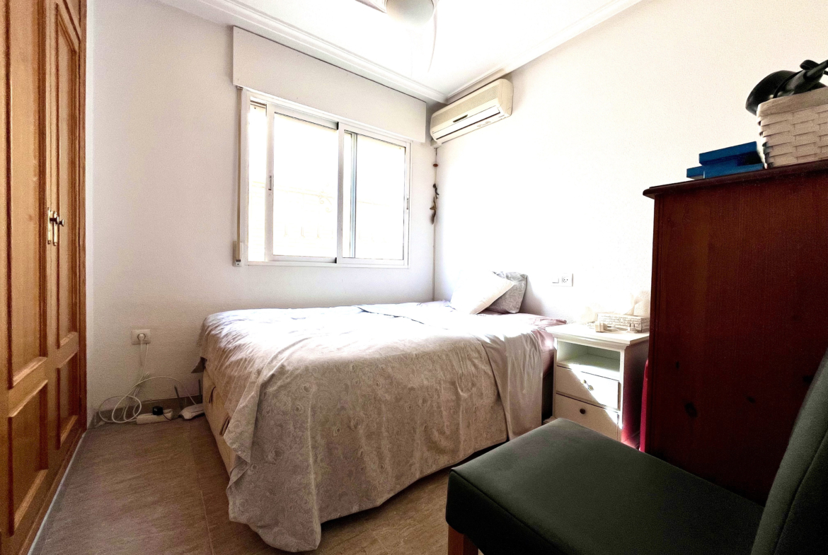 Bright double bedroom with air conditioning in Los Alcázares house by Levante Properties.