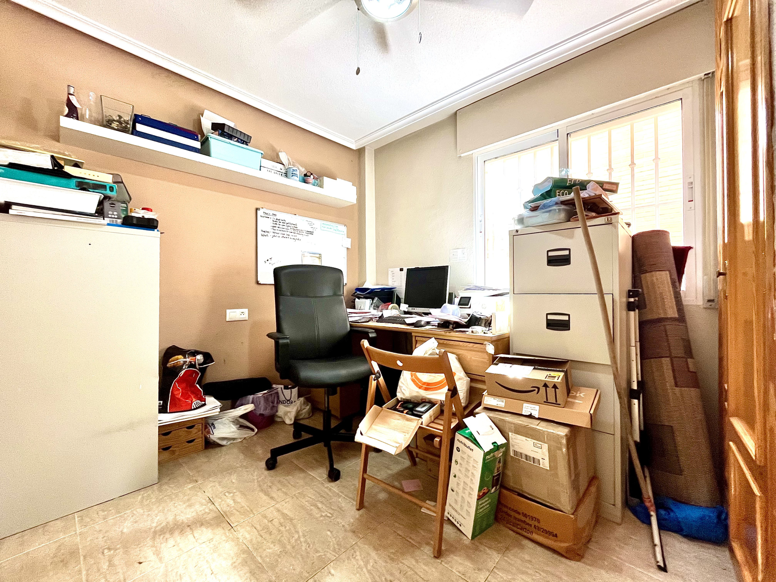 Guest bedroom currently used as office in semi-detached Los Narejos property by Levante Properties.