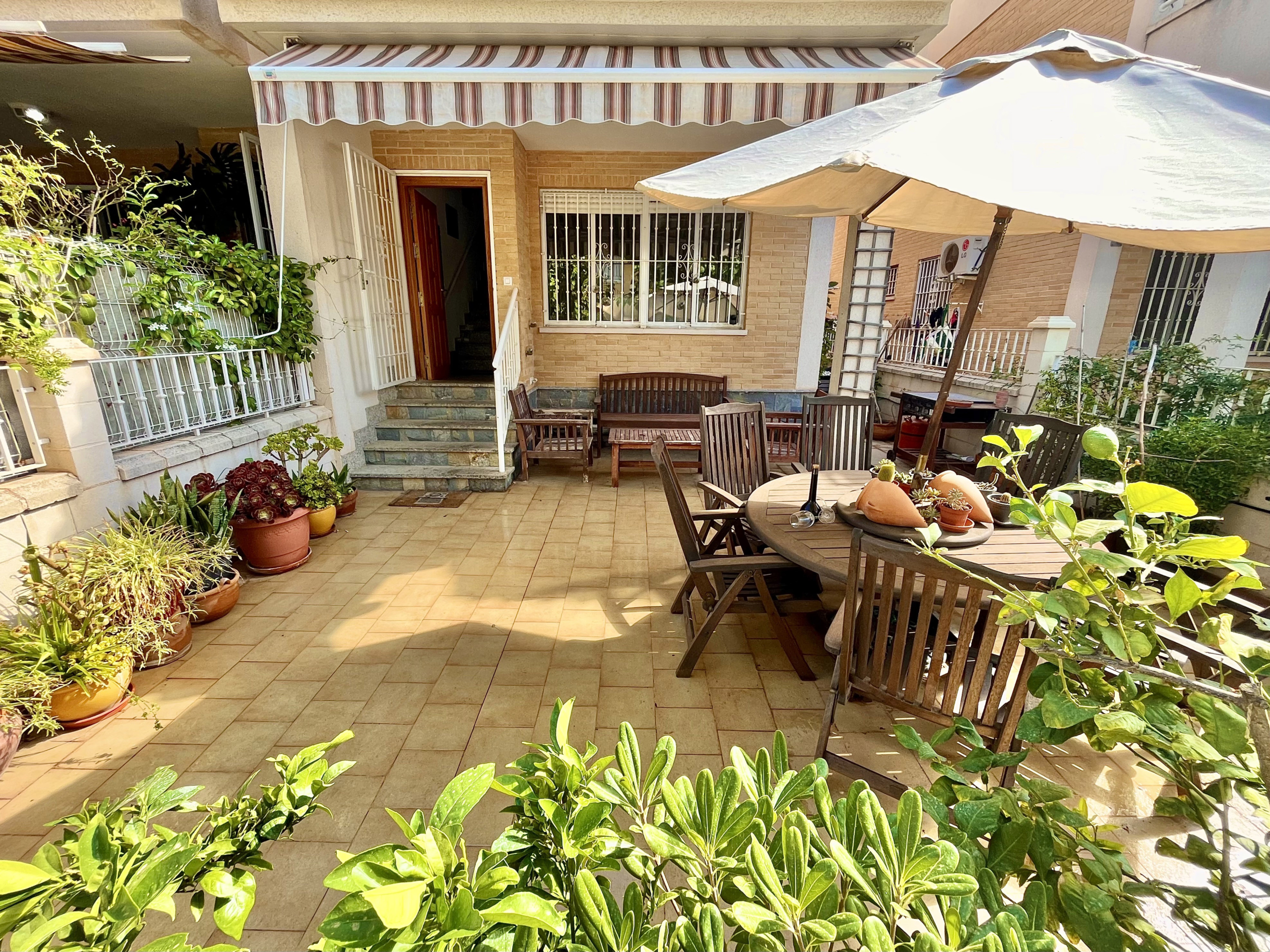 Sunny terrace of semi-detached family home near the beach in Los Narejos, Levante Properties listing.