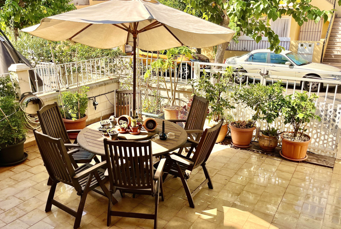 Sunny terrace of semi-detached family home near the beach in Los Narejos, Levante Properties listing.