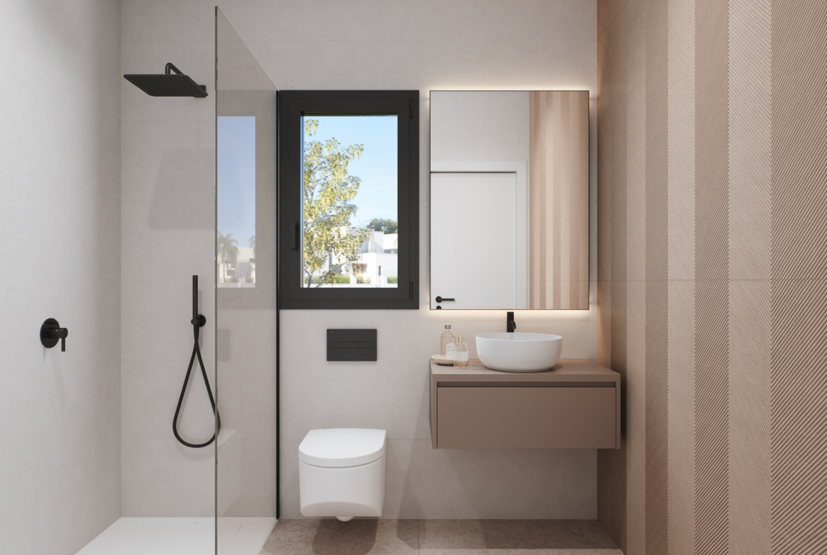 Stylish modern bathroom with contemporary fixtures and finishes at Tindra El Lago Apartments, Santa Rosalia, by Levante Properties.