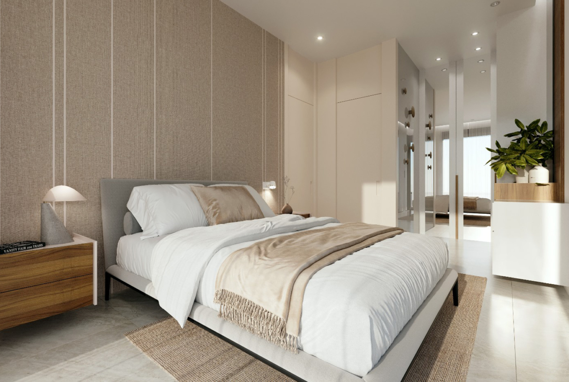Luxury master bedroom suite in Orbesol Mirador Villa at Santa Rosalia, listed by Levante Properties and complemented by a modern designer kitchen.