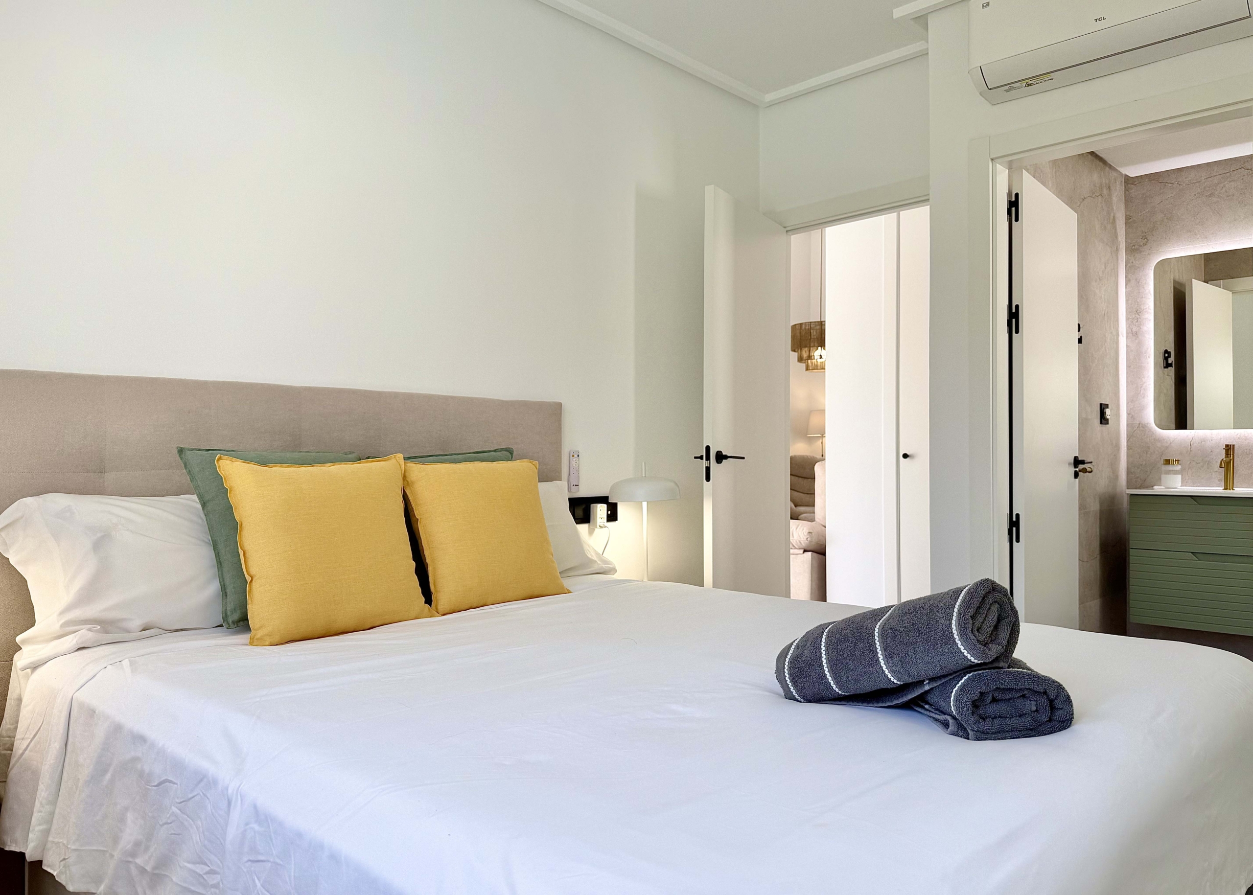 Modernised bedroom with climate control at the Rondella villa in Mar Menor Golf Resort.