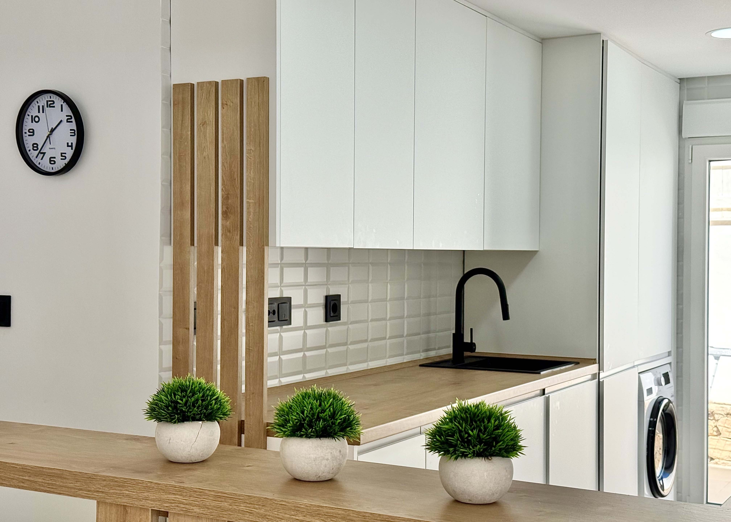 Levante Properties presents this modernised kitchen fitted with premium appliances and elegant finishes at Mar Menor Golf Resort.