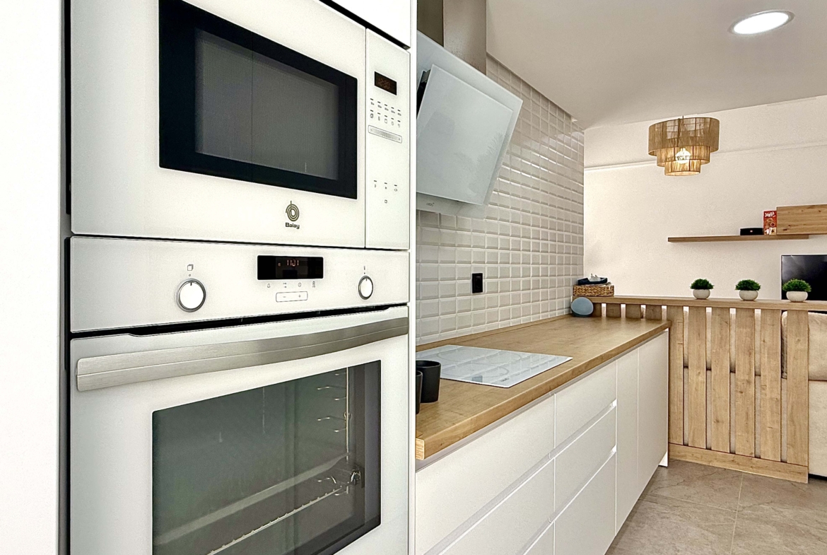 Modern fully equipped kitchen at the Rondella villa in Mar Menor Golf Resort.