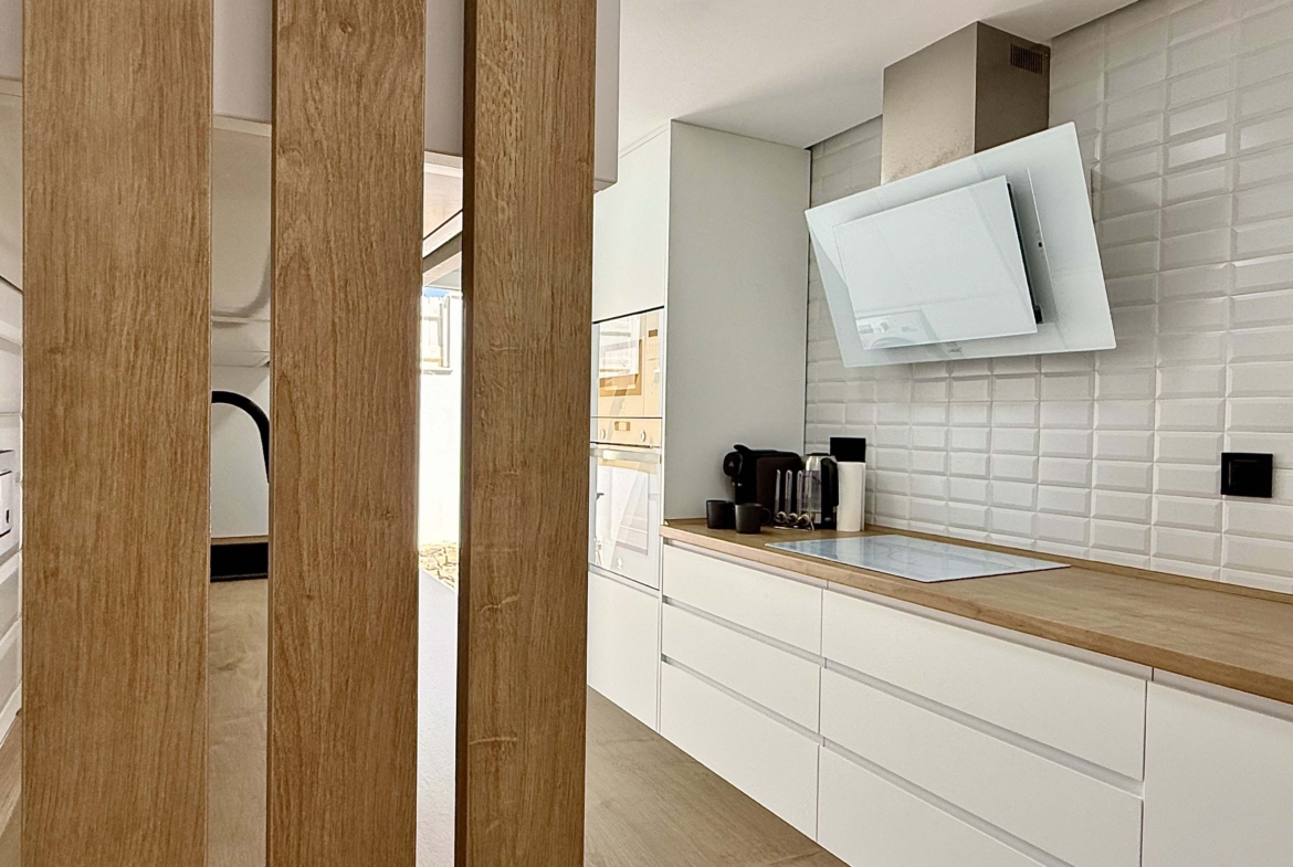 Modern fully equipped kitchen at the Rondella villa in Mar Menor Golf Resort.