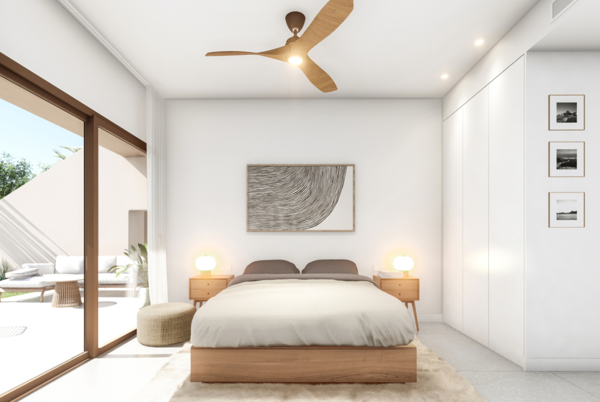 Bedroom with terrace and pool view at Roda Residences by Levante Properties