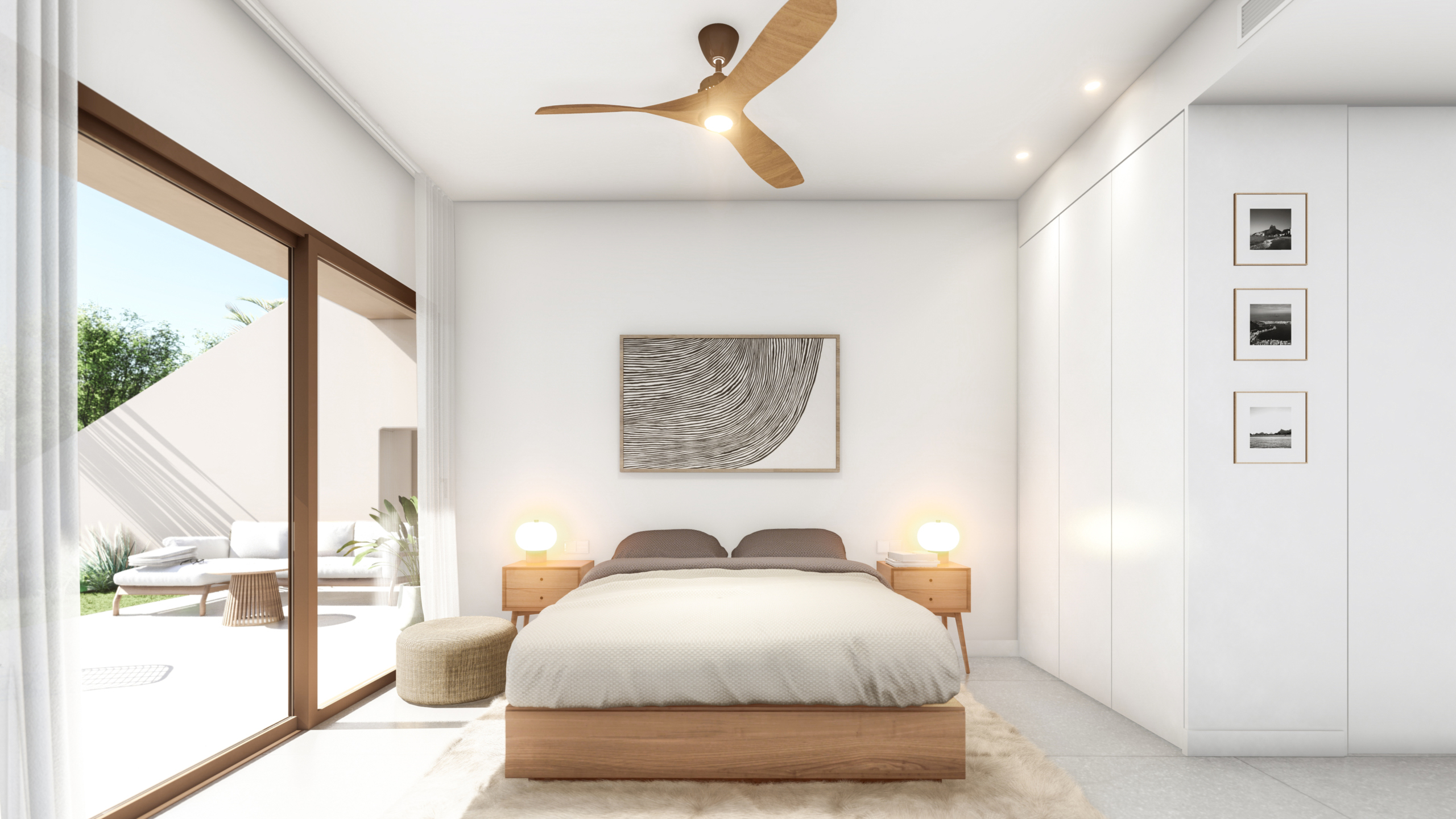 Bedroom with terrace and pool view at Roda Residences by Levante Properties