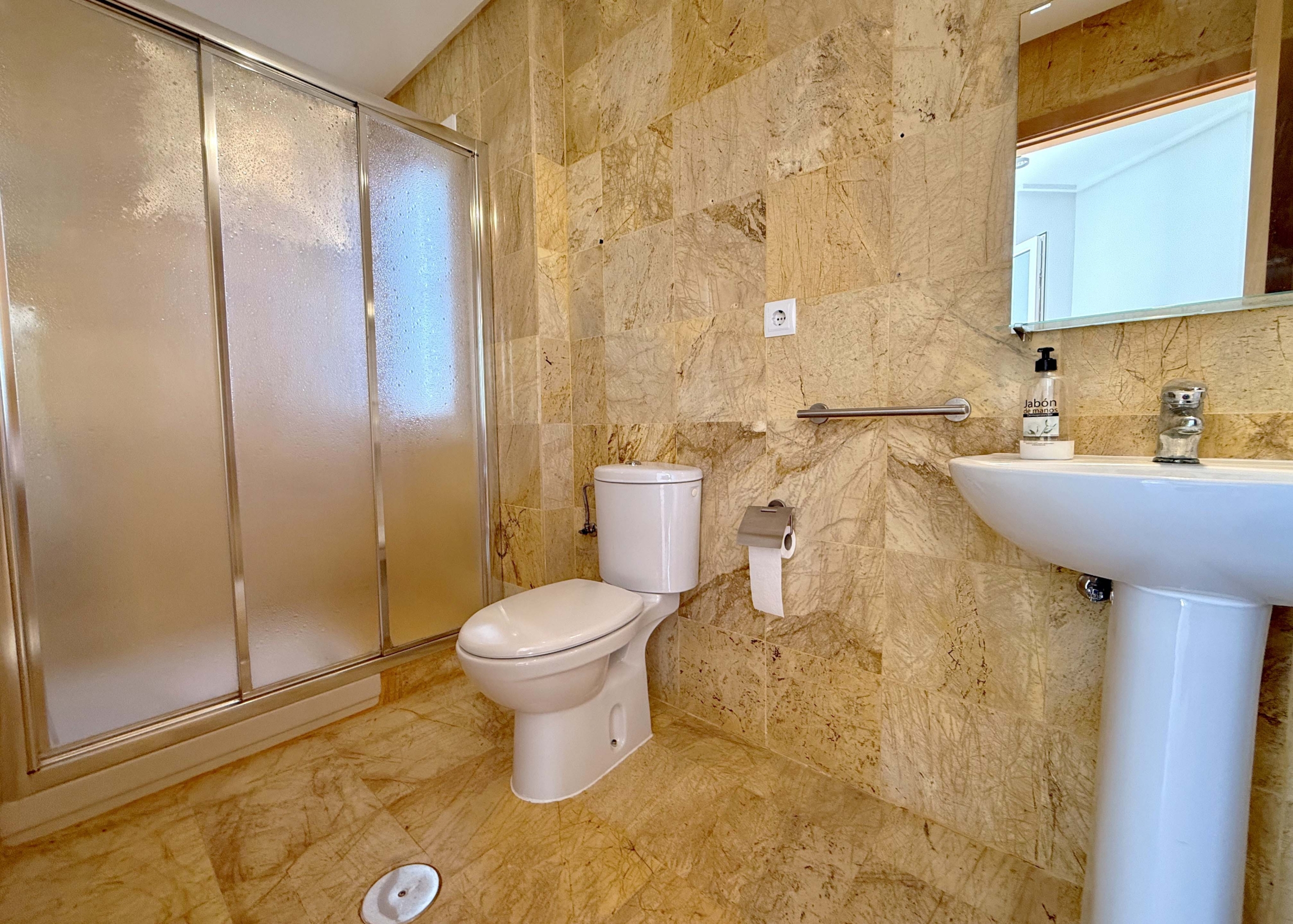 Modern family bathroom in Mar Menor Golf Resort villa presented by Levante Properties