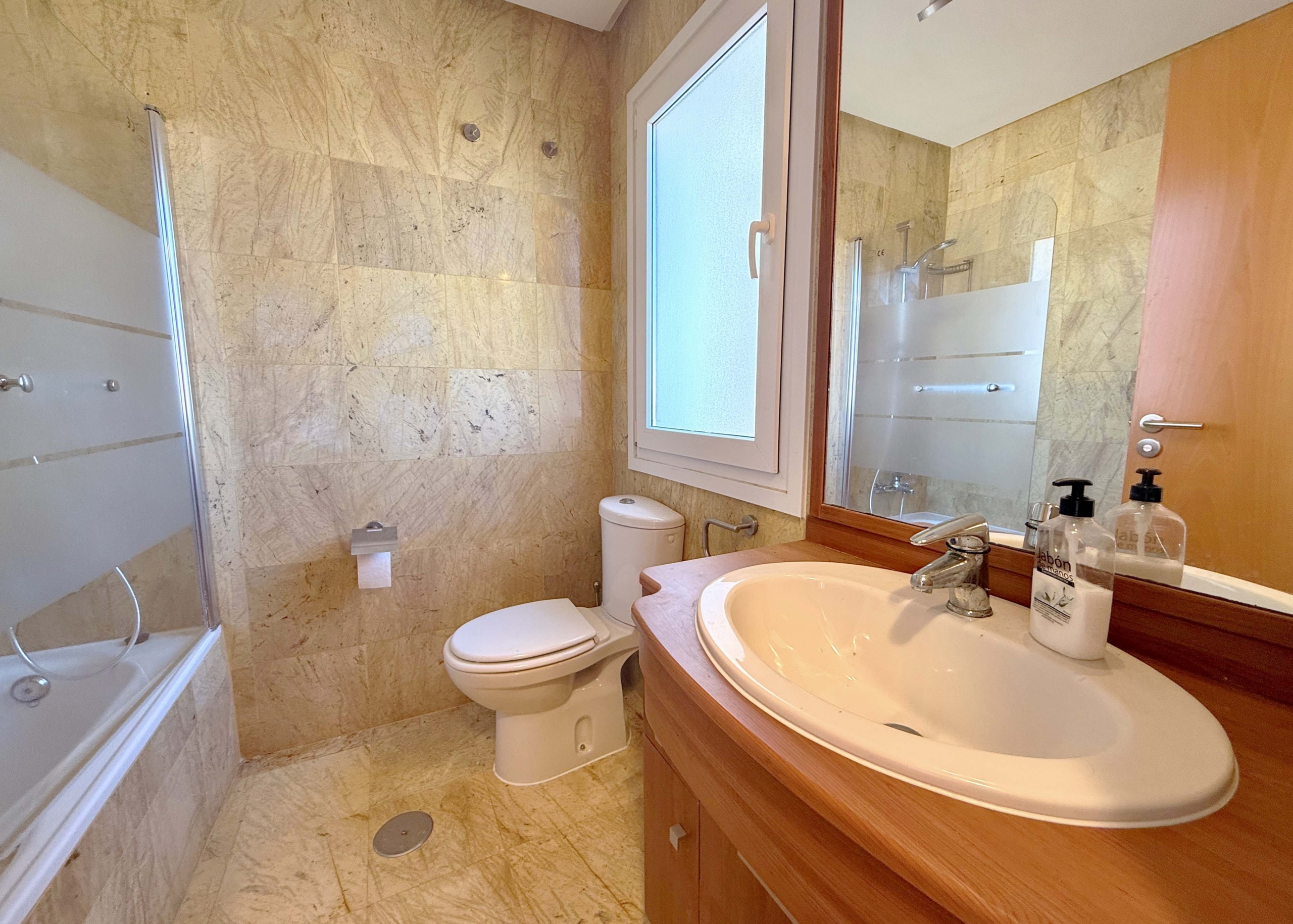Modern en-suite bathroom in master bedroom of Mar Menor Golf Resort villa by Levante Properties