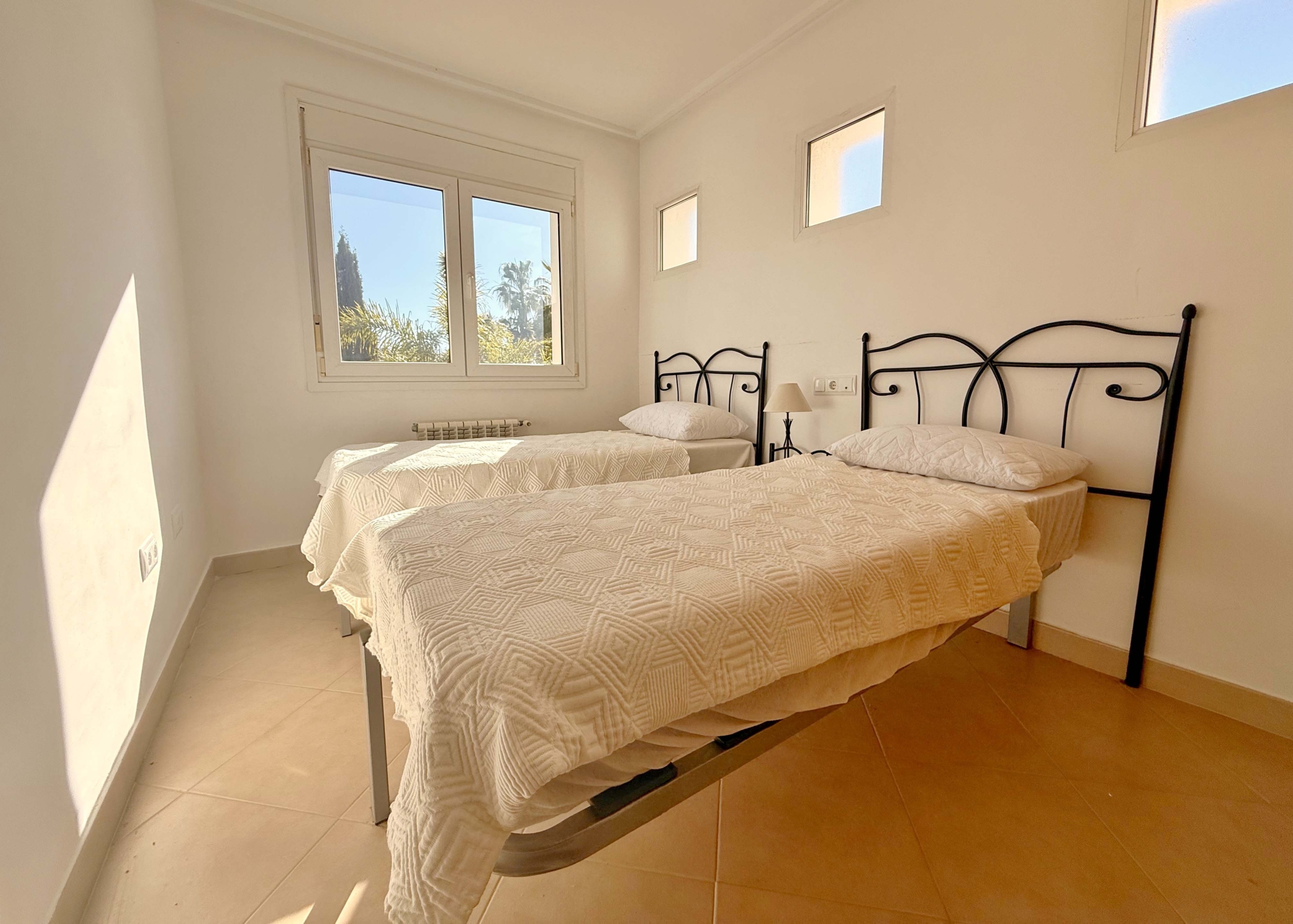 Bright guest bedroom in a 4-bedroom villa at Mar Menor Golf Resort by Levante Properties