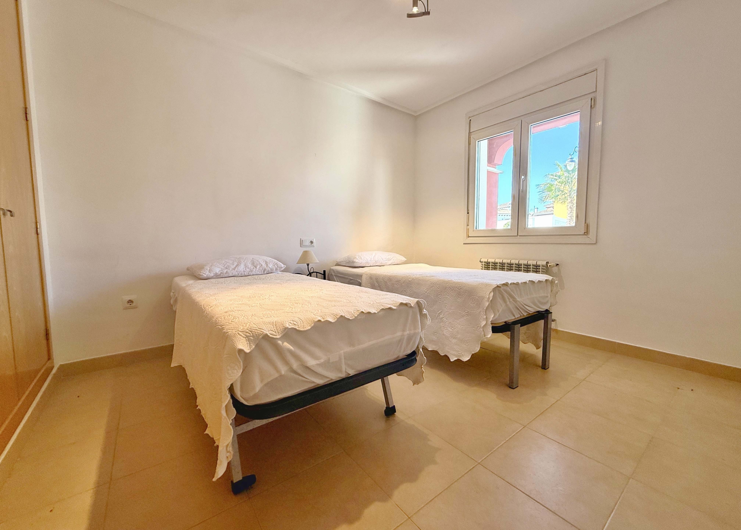 Bright guest bedroom in a 4-bedroom villa at Mar Menor Golf Resort by Levante Properties