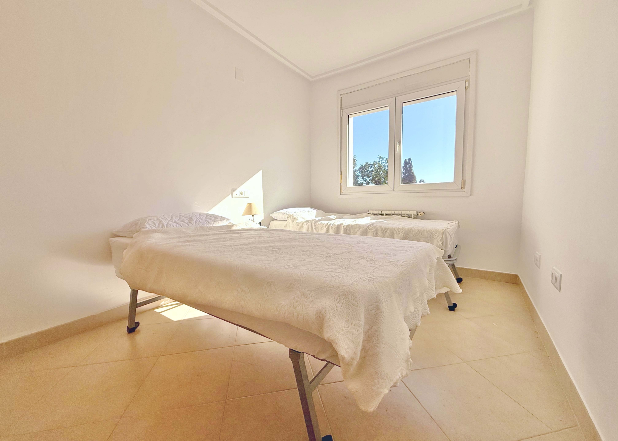 Bright guest bedroom in a 4-bedroom villa at Mar Menor Golf Resort by Levante Properties