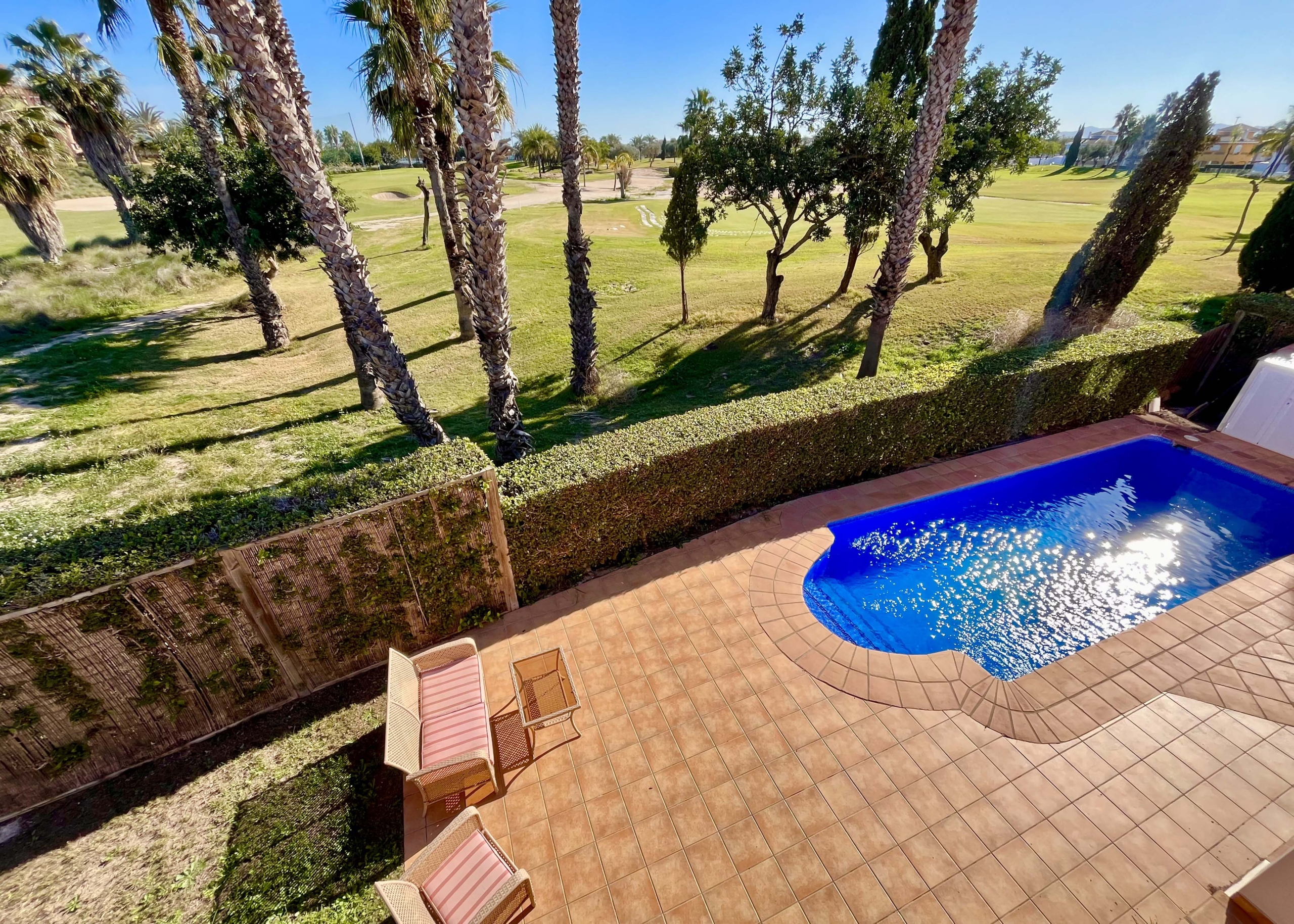 Private swimming pool and garden with golf views at Mar Menor Golf Resort villa by Levante Properties