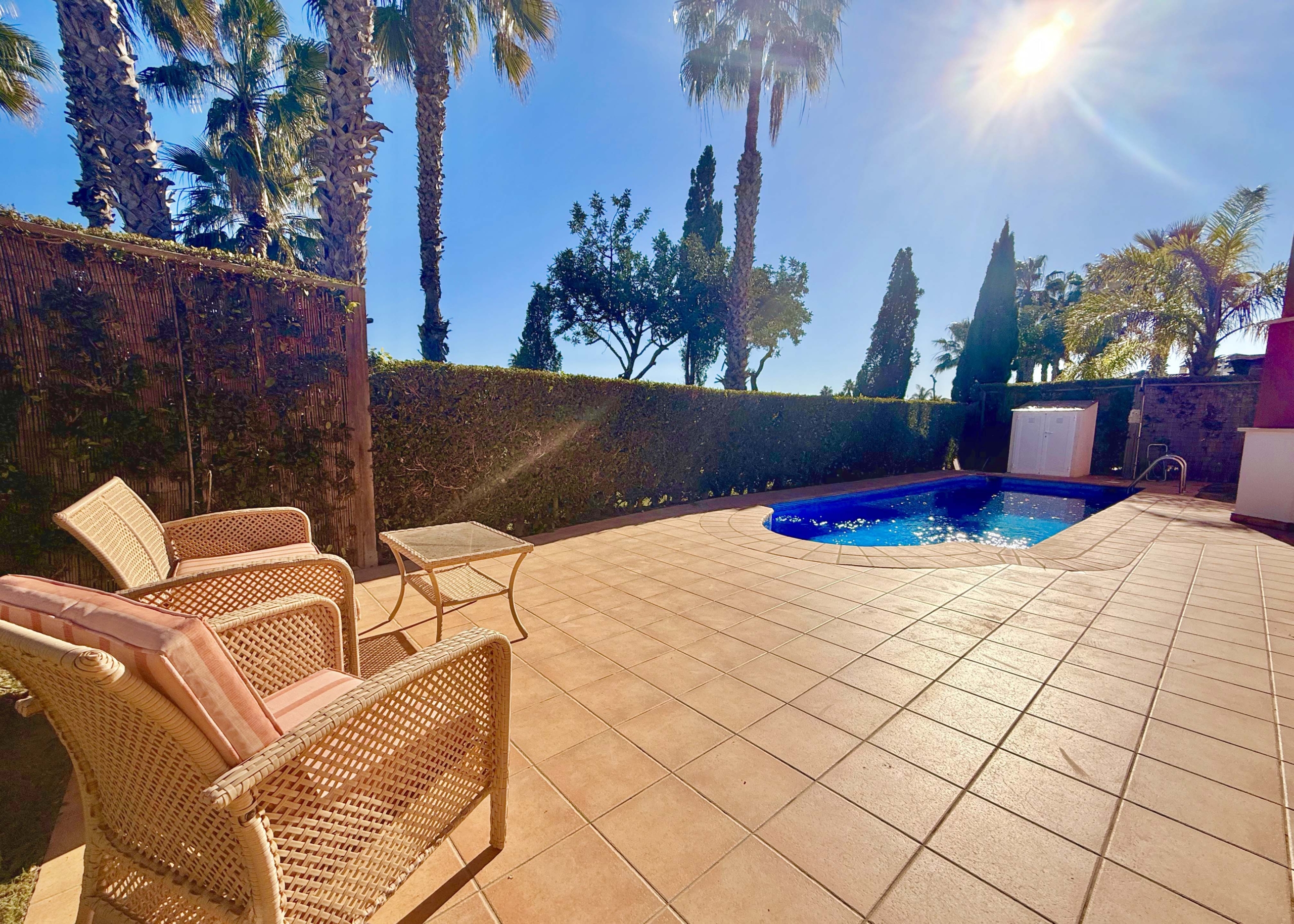 Private swimming pool and garden with golf views at Mar Menor Golf Resort villa by Levante Properties