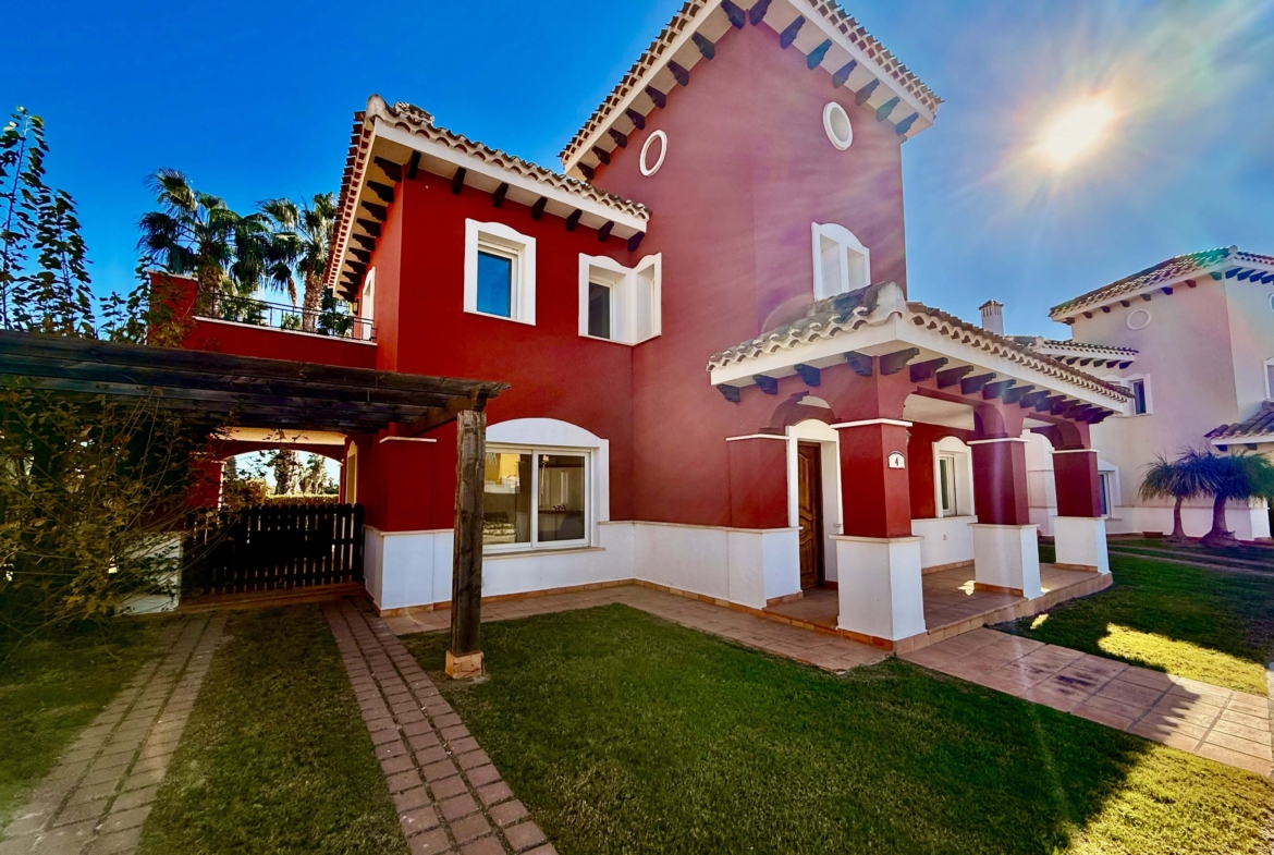 Front exterior of a 4-bedroom villa with private pool on Mar Menor Golf Resort by Levante Properties