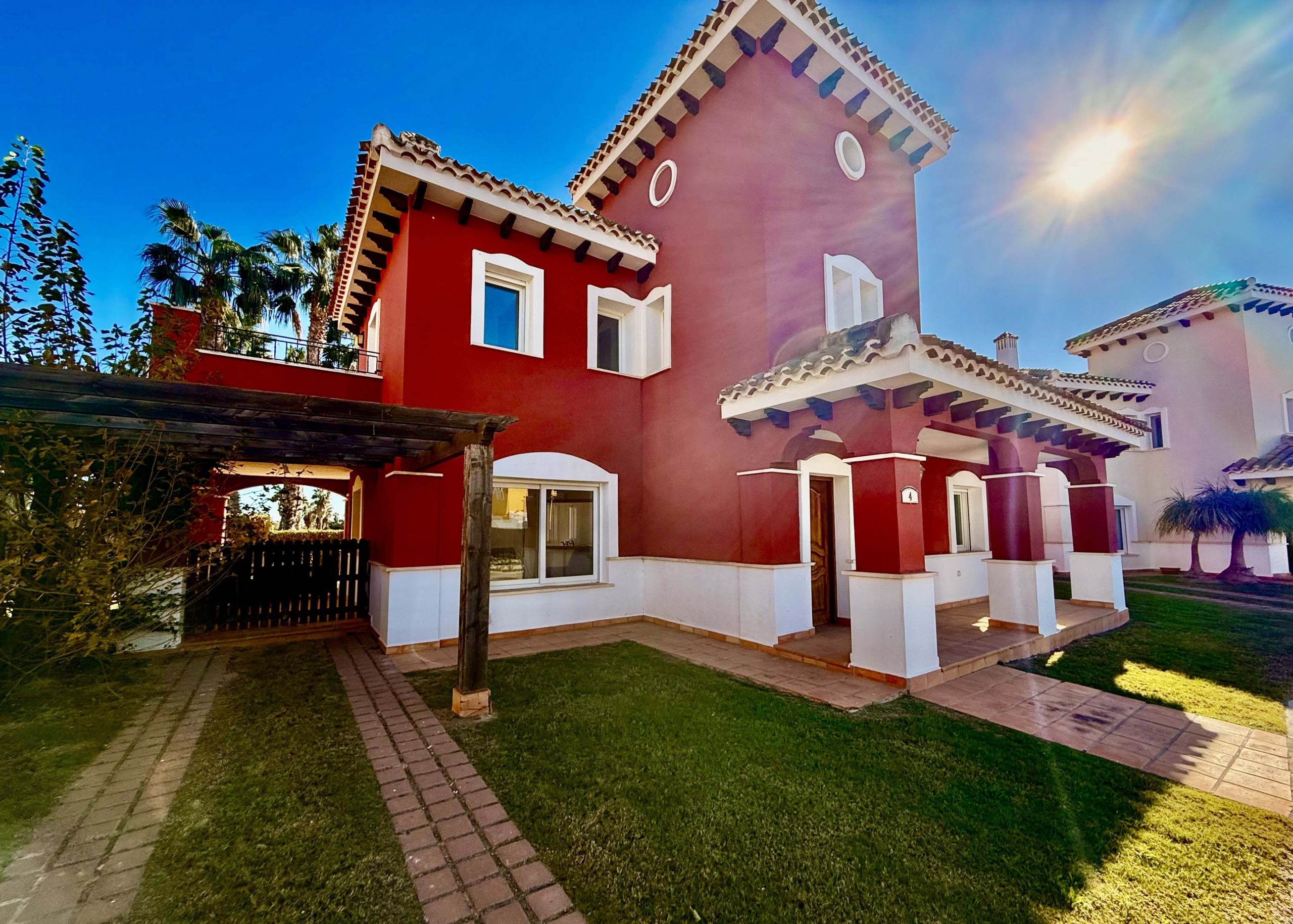 Front exterior of a 4-bedroom villa with private pool on Mar Menor Golf Resort by Levante Properties
