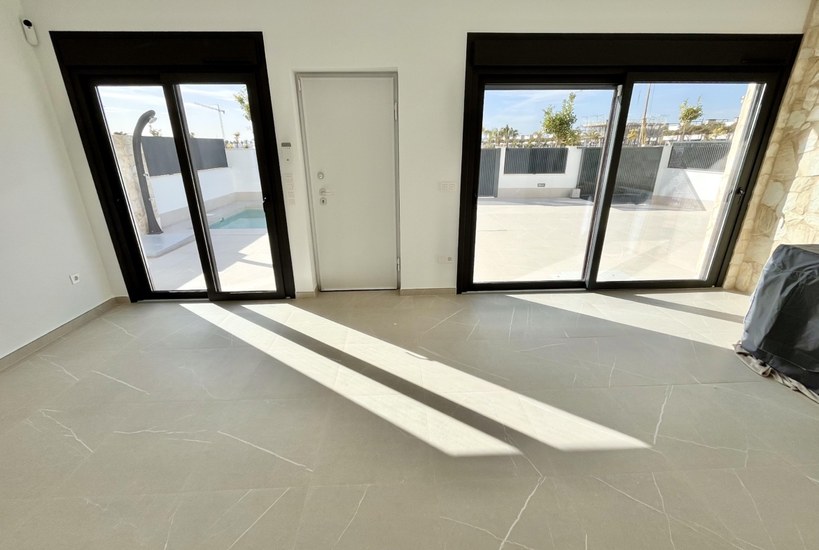 Open-plan living and dining area in a luxury villa at Santa Rosalía by Levante Properties