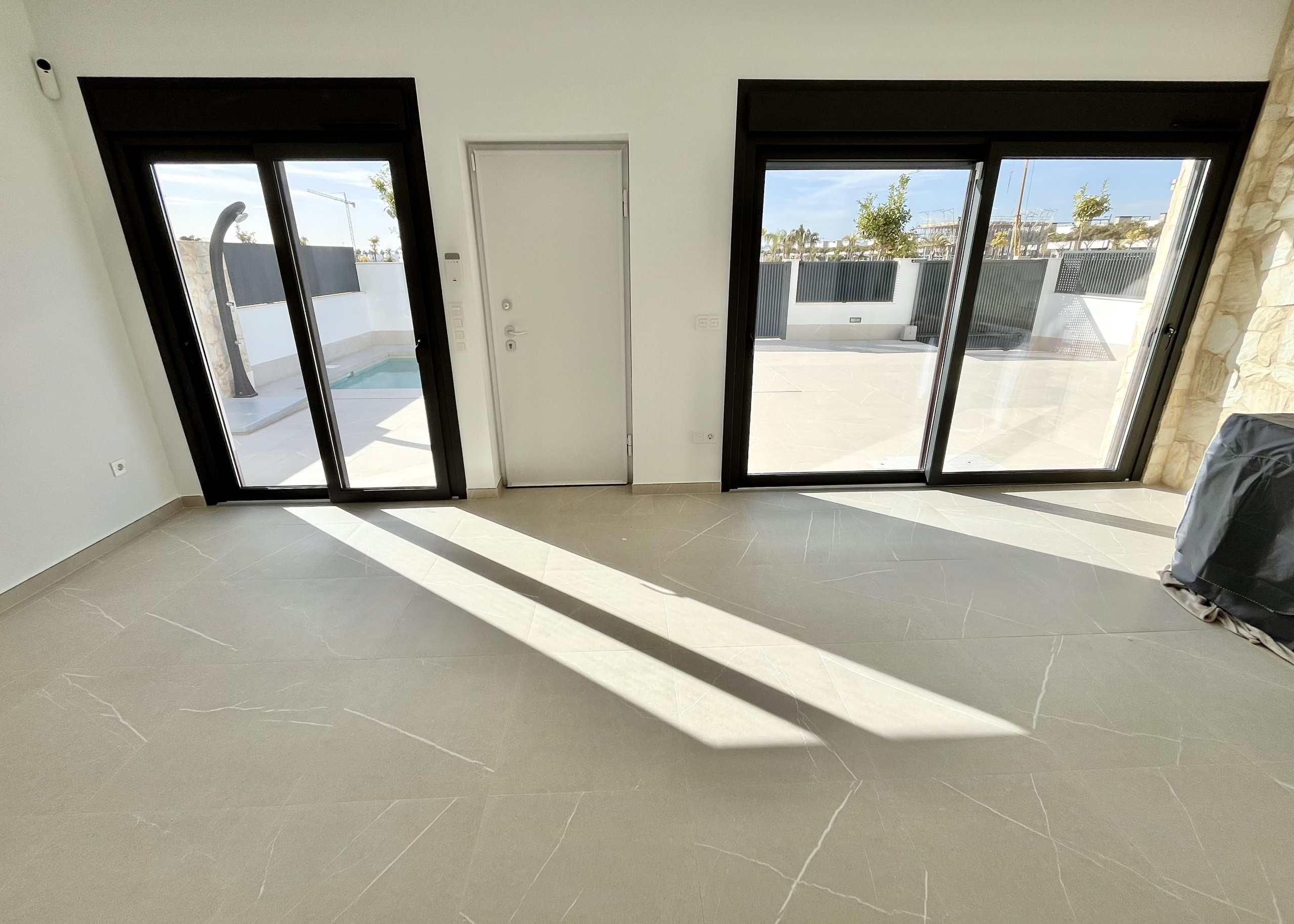 Open-plan living and dining area in a luxury villa at Santa Rosalía by Levante Properties