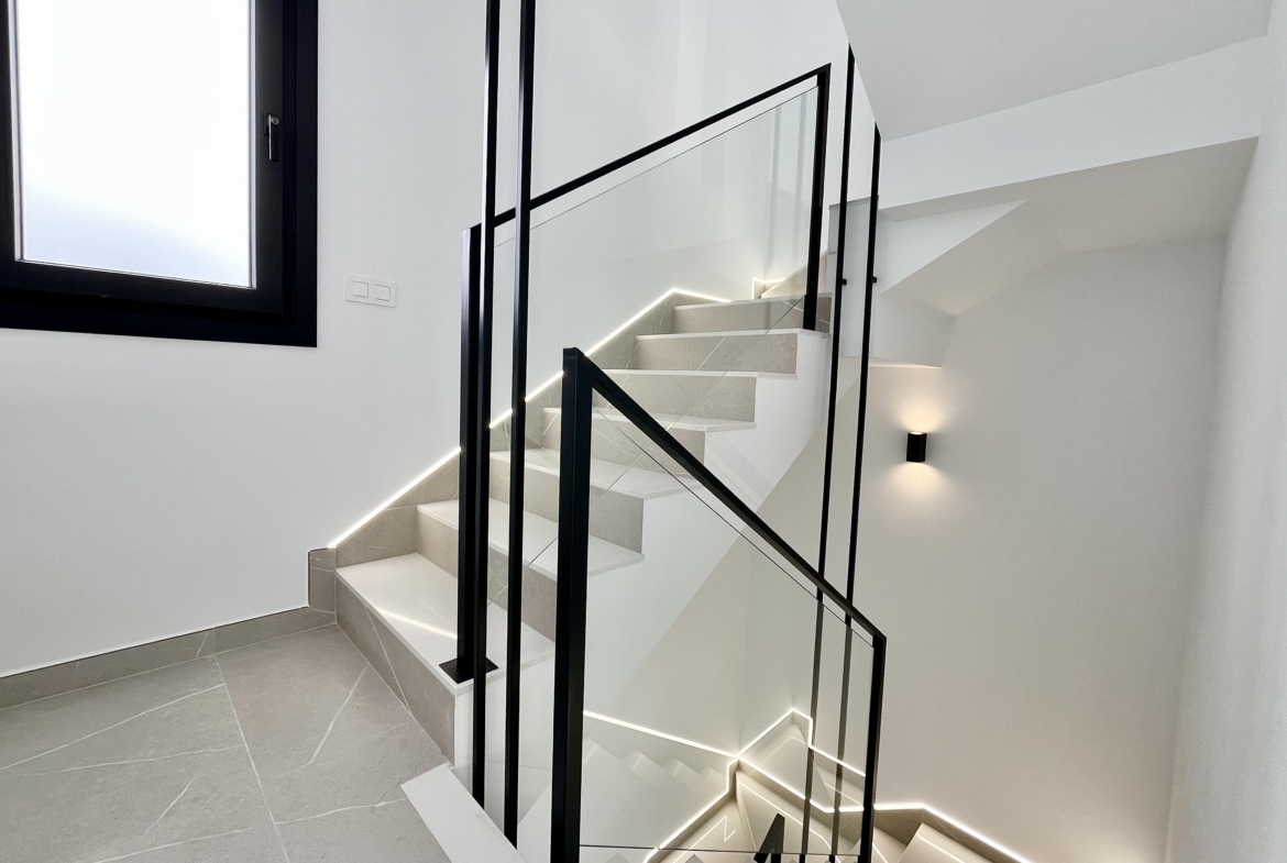 Staircase in a luxury villa at Santa Rosalía by Levante Properties