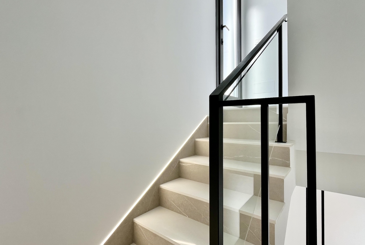 Staircase in a luxury villa at Santa Rosalía by Levante Properties