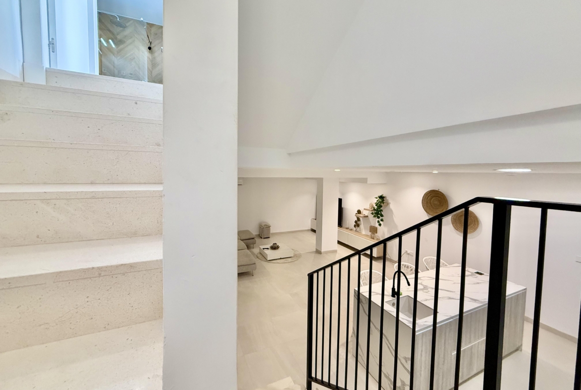 Luxury basement suite with kitchen and freestanding bath in Lavanda villa Santa Rosalia by Levante Properties