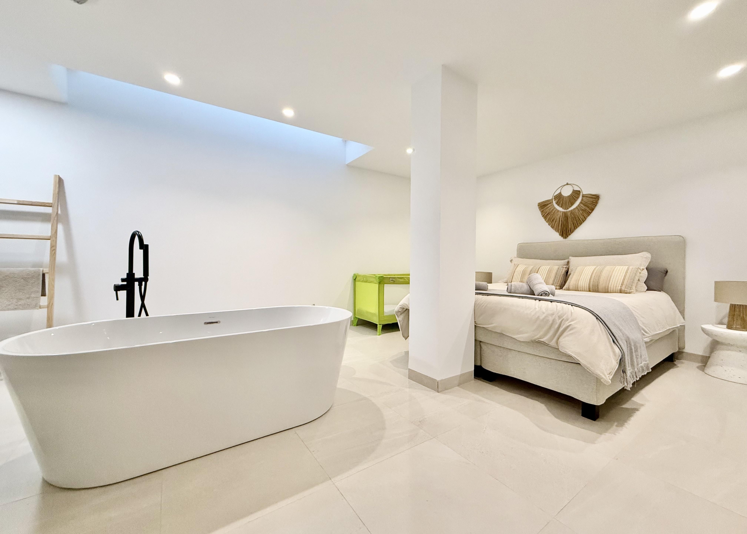 Luxury basement suite with kitchen and freestanding bath in Lavanda villa Santa Rosalia by Levante Properties