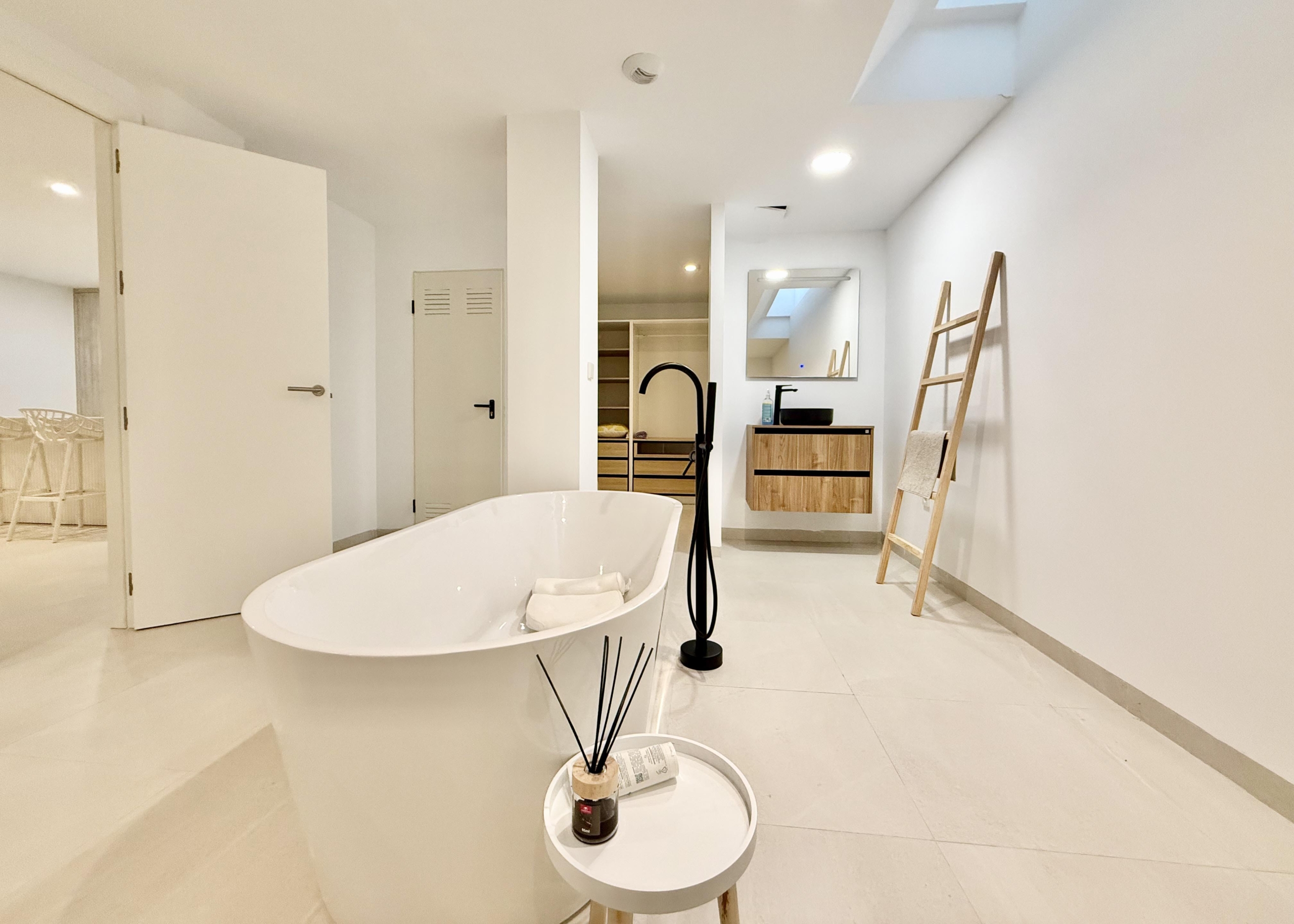 Luxury basement suite with kitchen and freestanding bath in Lavanda villa Santa Rosalia by Levante Properties