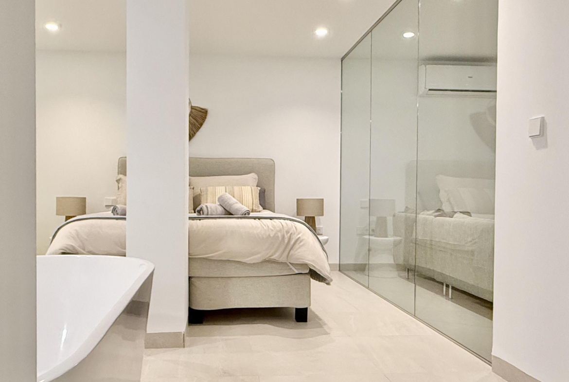 Luxury basement suite with kitchen and freestanding bath in Lavanda villa Santa Rosalia by Levante Properties