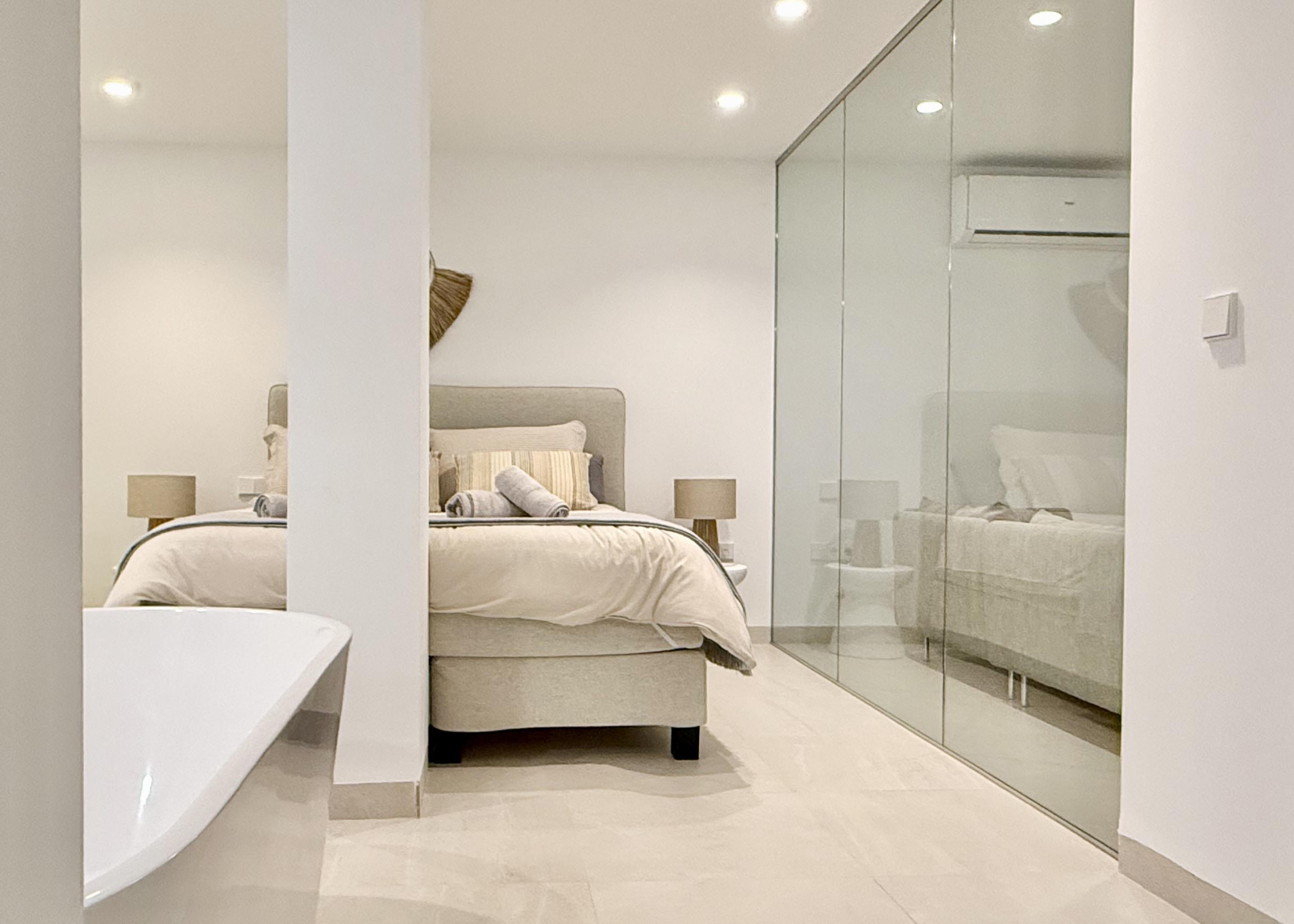 Luxury basement suite with kitchen and freestanding bath in Lavanda villa Santa Rosalia by Levante Properties