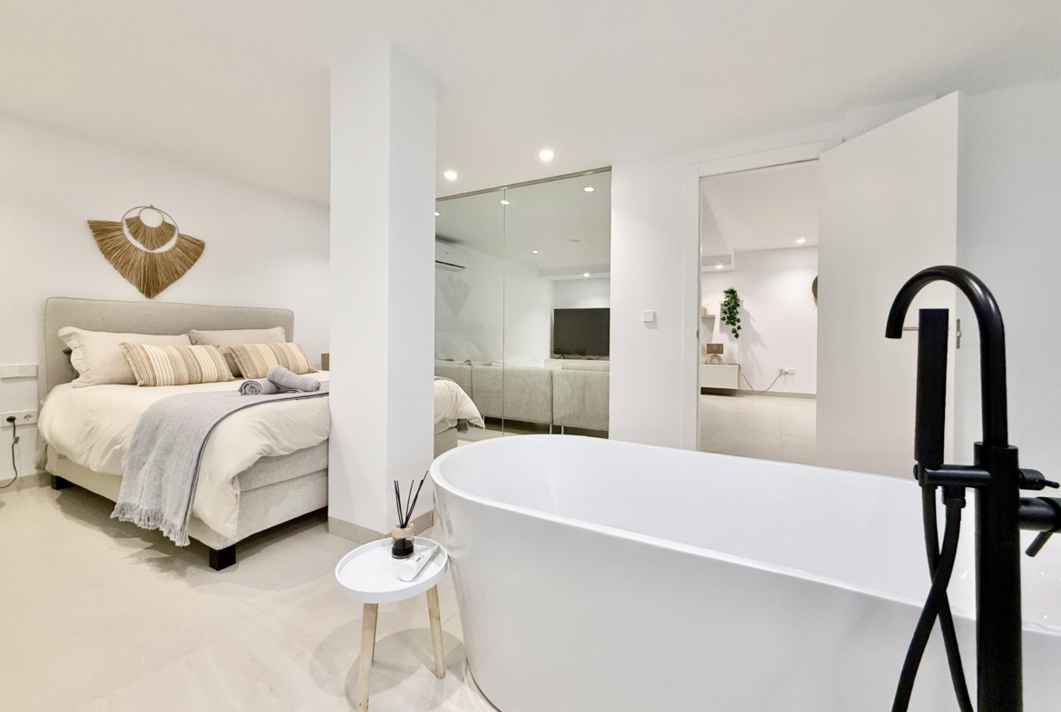 Luxury basement suite with kitchen and freestanding bath in Lavanda villa Santa Rosalia by Levante Properties