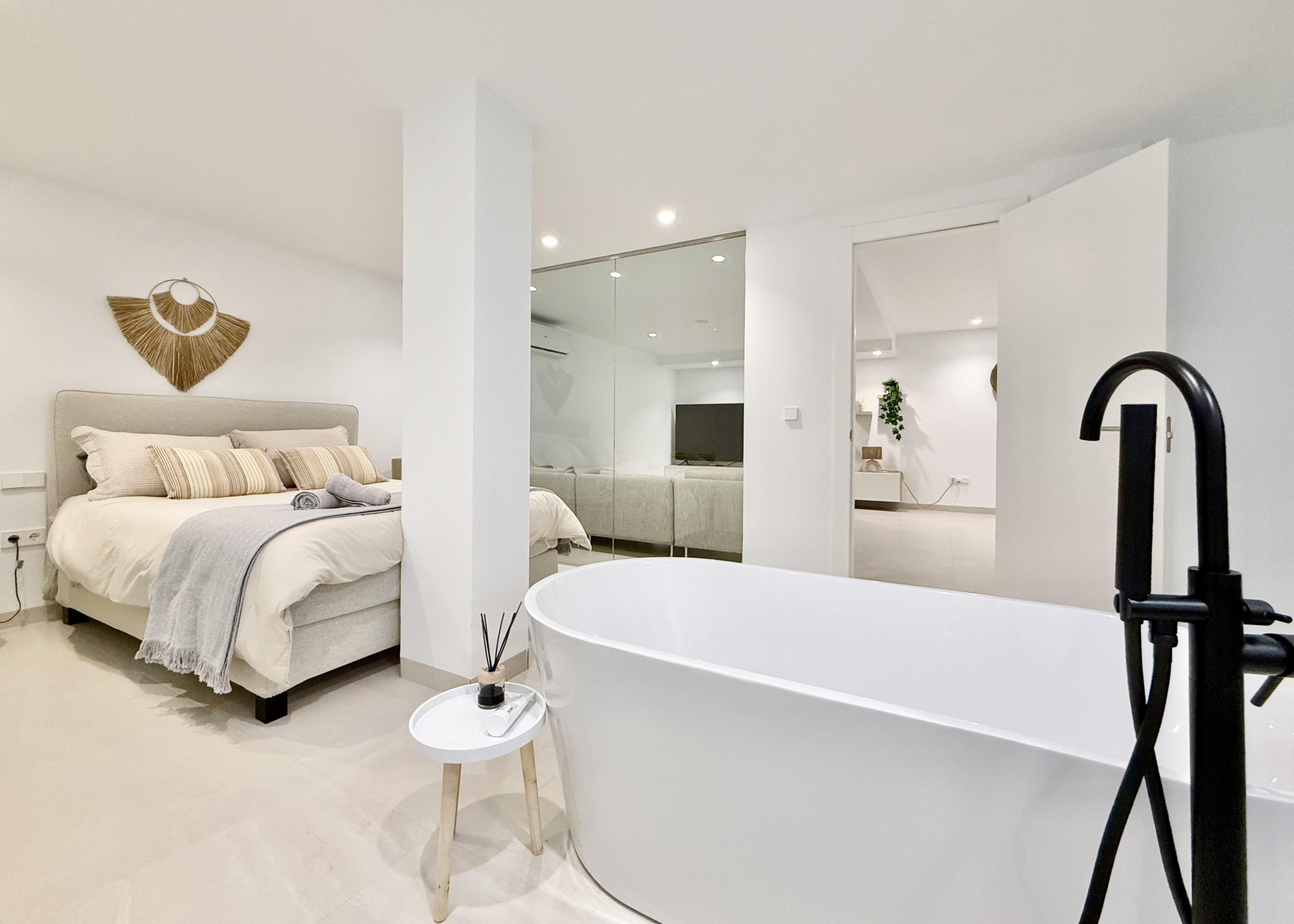 Luxury basement suite with kitchen and freestanding bath in Lavanda villa Santa Rosalia by Levante Properties