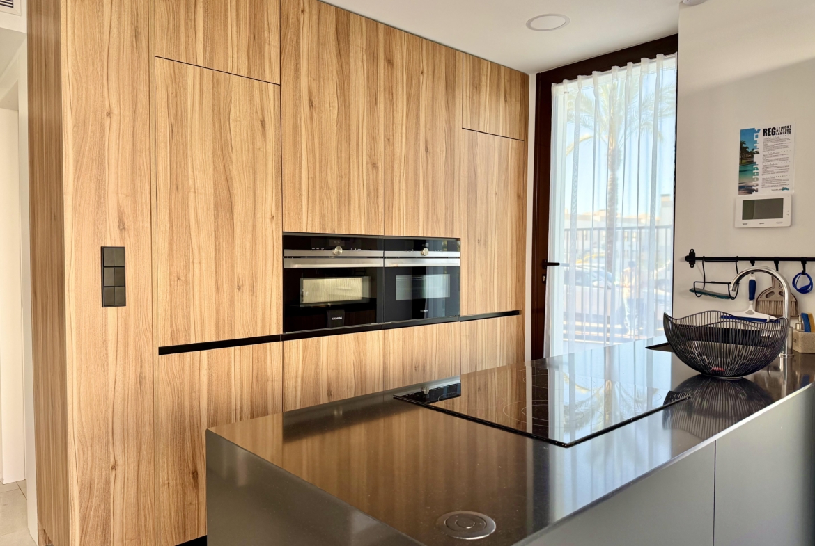 Fully equipped modern kitchen in Lavanda villa at Santa Rosalia Resort by Levante Properties
