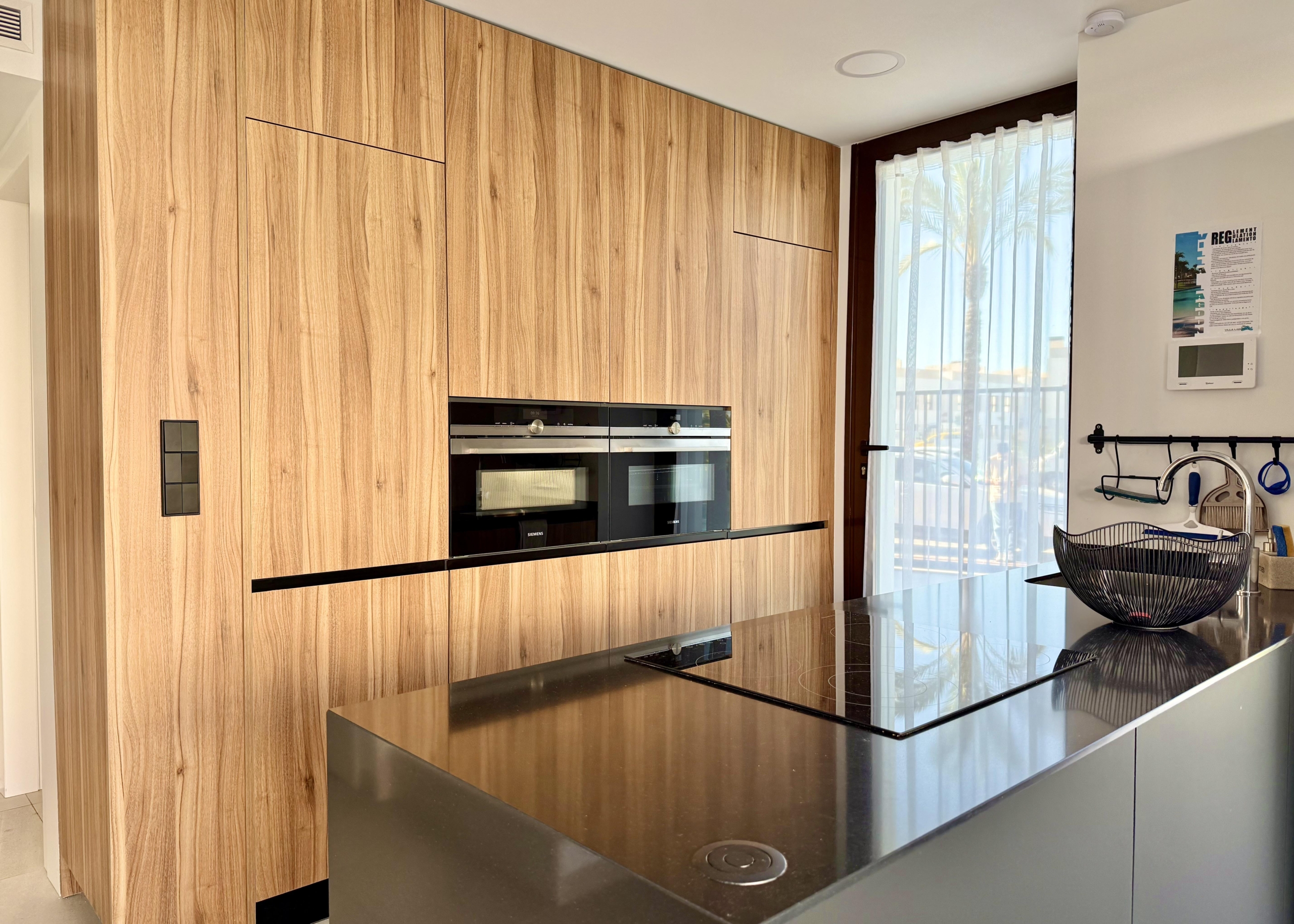 Fully equipped modern kitchen in Lavanda villa at Santa Rosalia Resort by Levante Properties