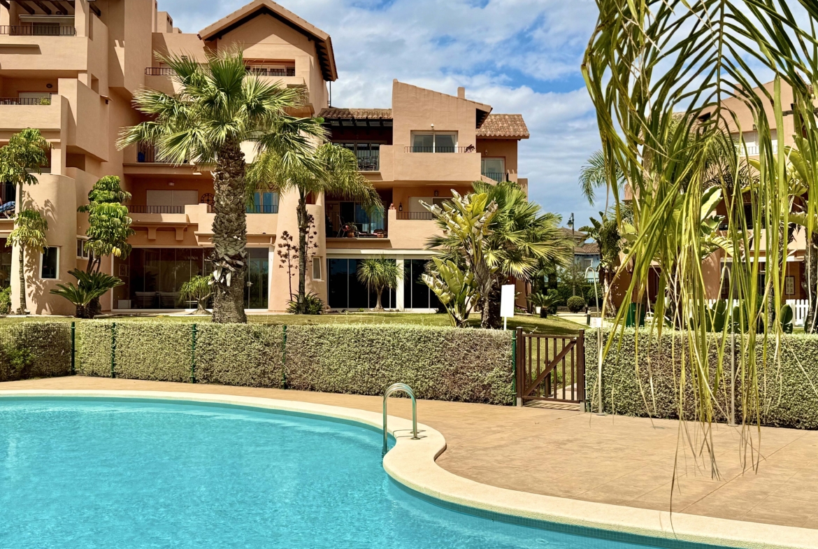 Communal swimming pool at Mar Menor Golf Resort by Levante Properties