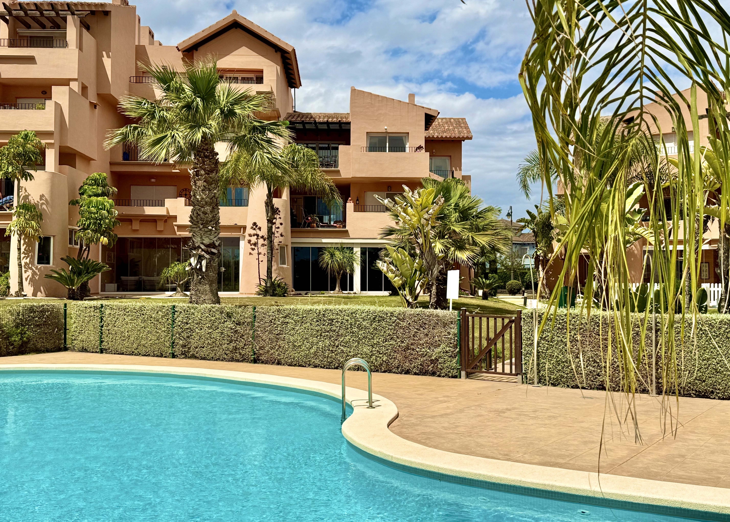 Communal swimming pool at Mar Menor Golf Resort by Levante Properties