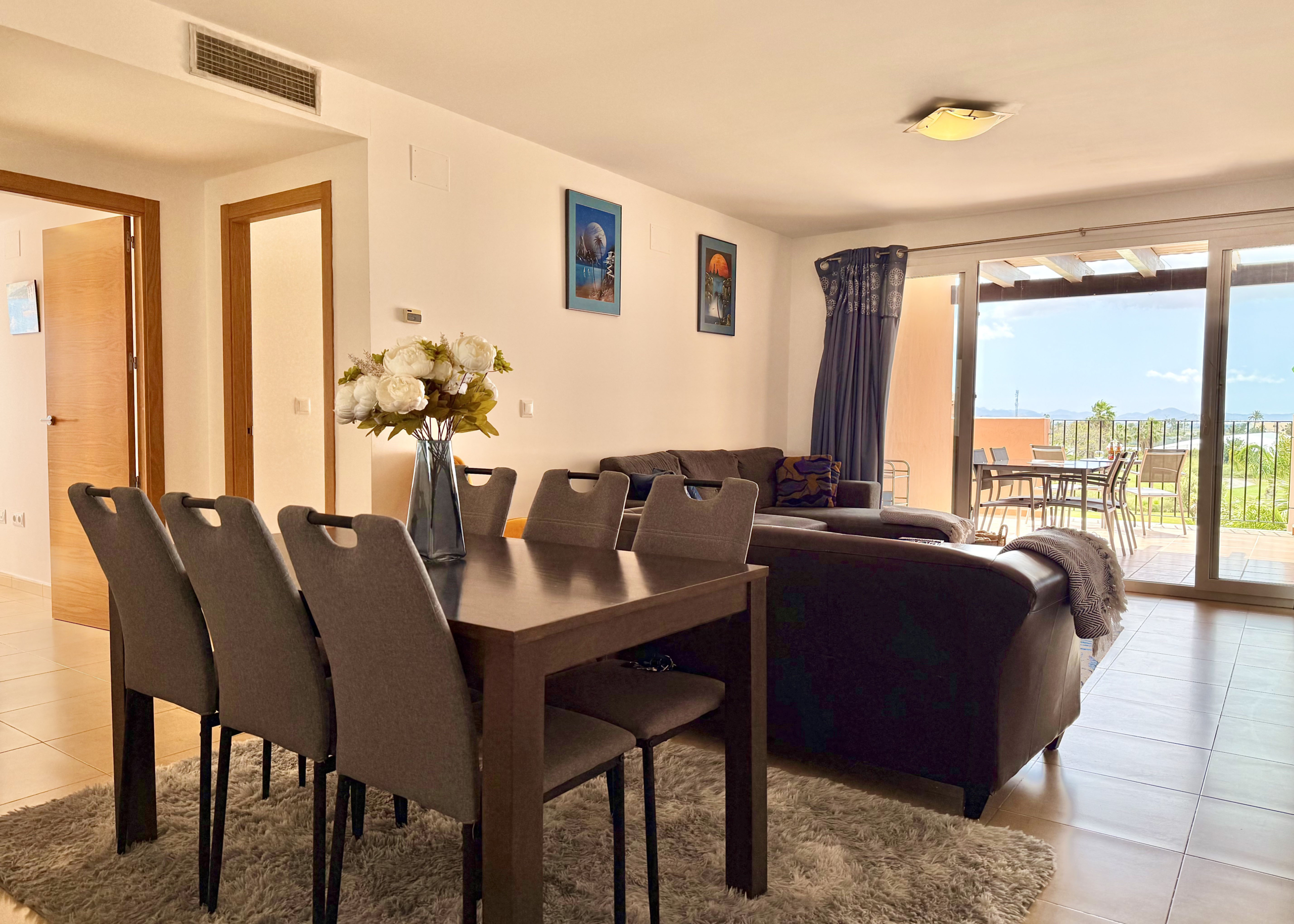 Modern open-plan living room in Levante Properties penthouse Mar Menor Golf Resort