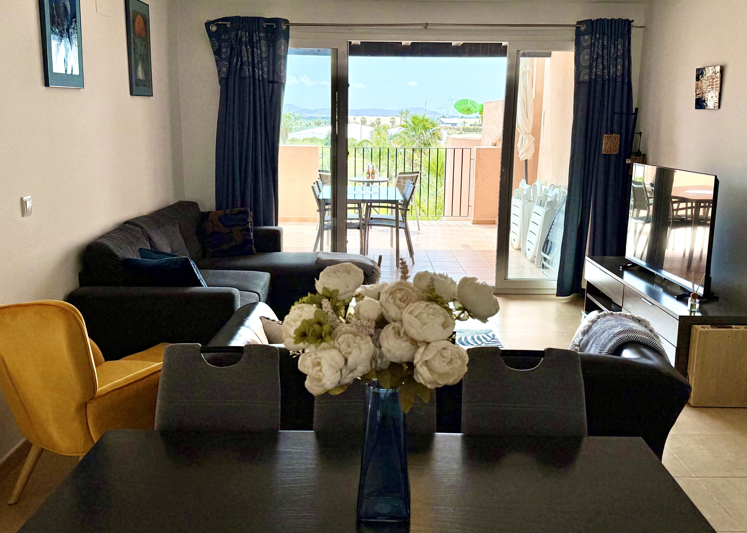 Modern open-plan living room in Levante Properties penthouse Mar Menor Golf Resort