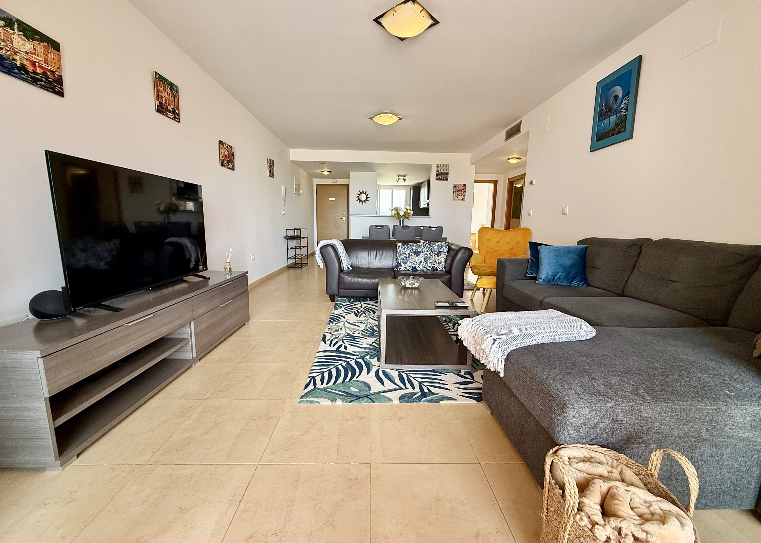 Modern open-plan living room in Levante Properties penthouse Mar Menor Golf Resort