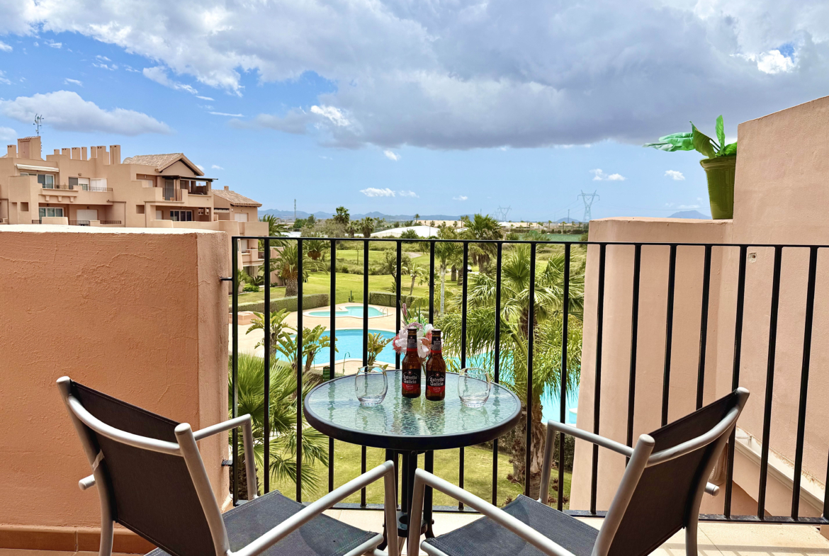 South-facing terrace with pool and golf views Mar Menor Golf Resort Levante Properties