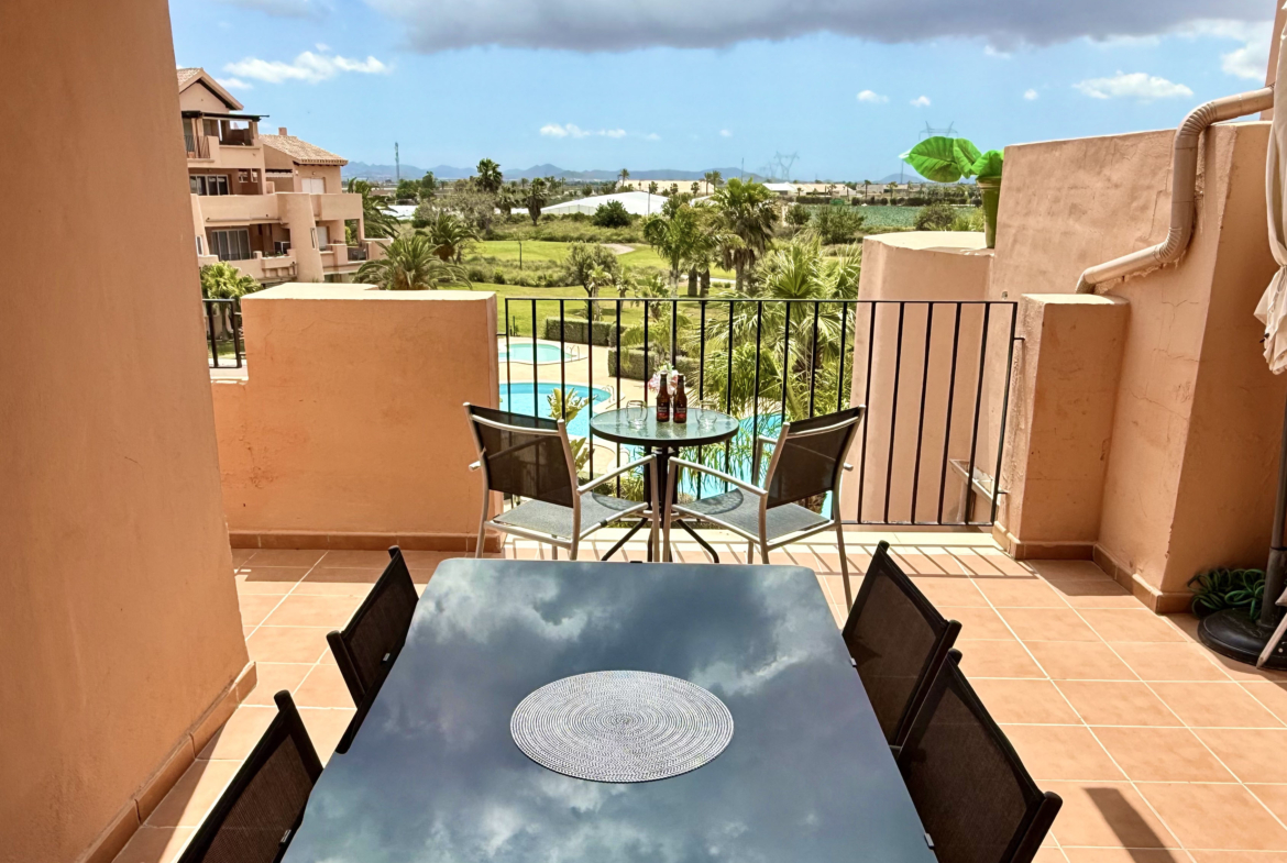 South-facing terrace with pool and golf views Mar Menor Golf Resort Levante Properties
