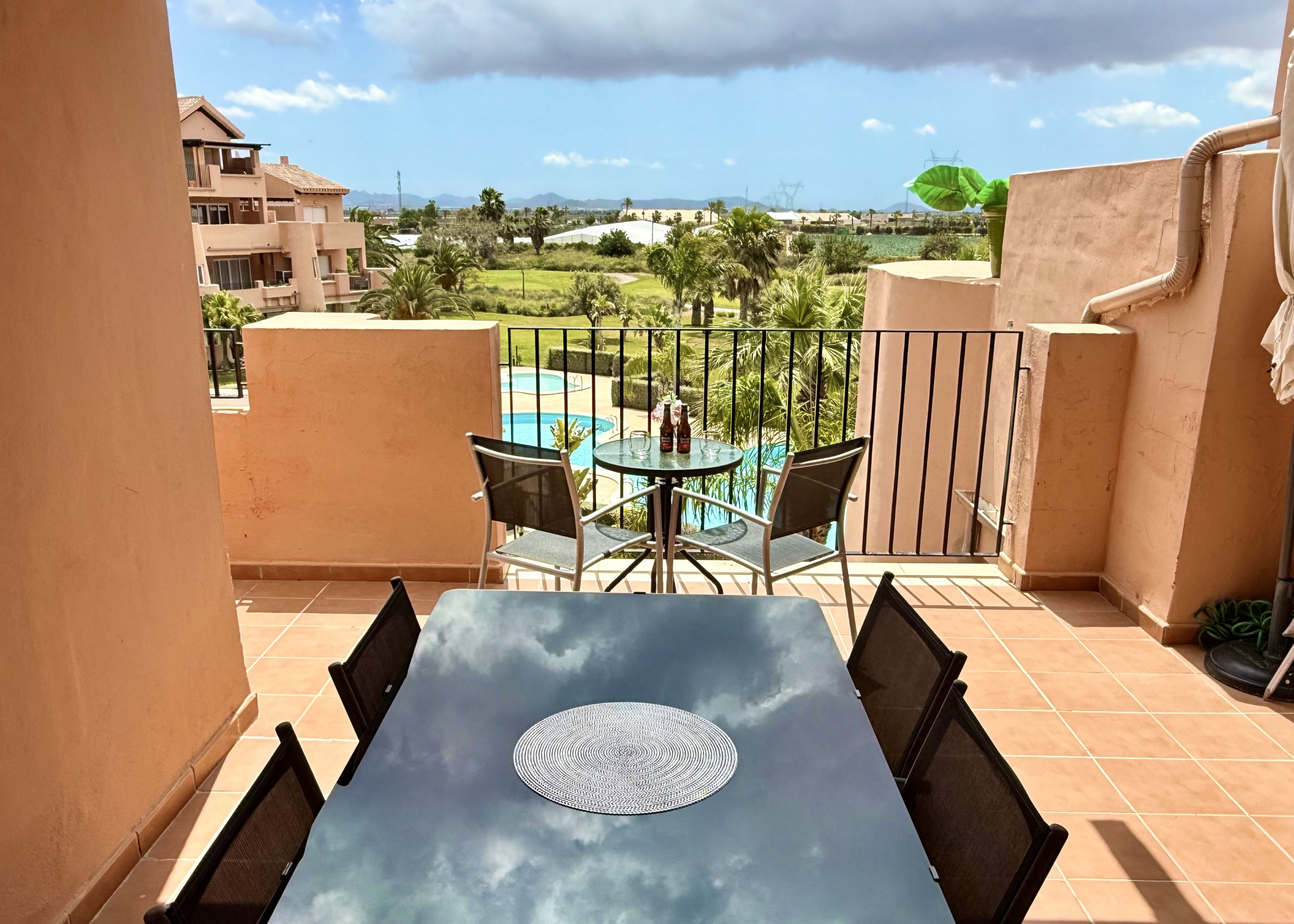 South-facing terrace with pool and golf views Mar Menor Golf Resort Levante Properties