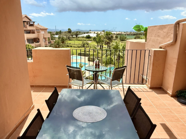 South-facing luxury penthouse terrace at Mar Menor Golf Resort with pool and golf course views by Levante Properties