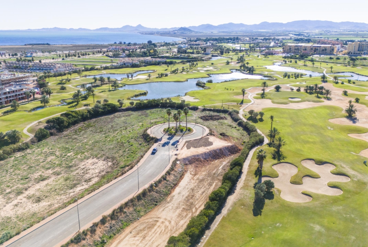 Aerial view of Apartments La Serena Golf with golf-course views by Levante Properties