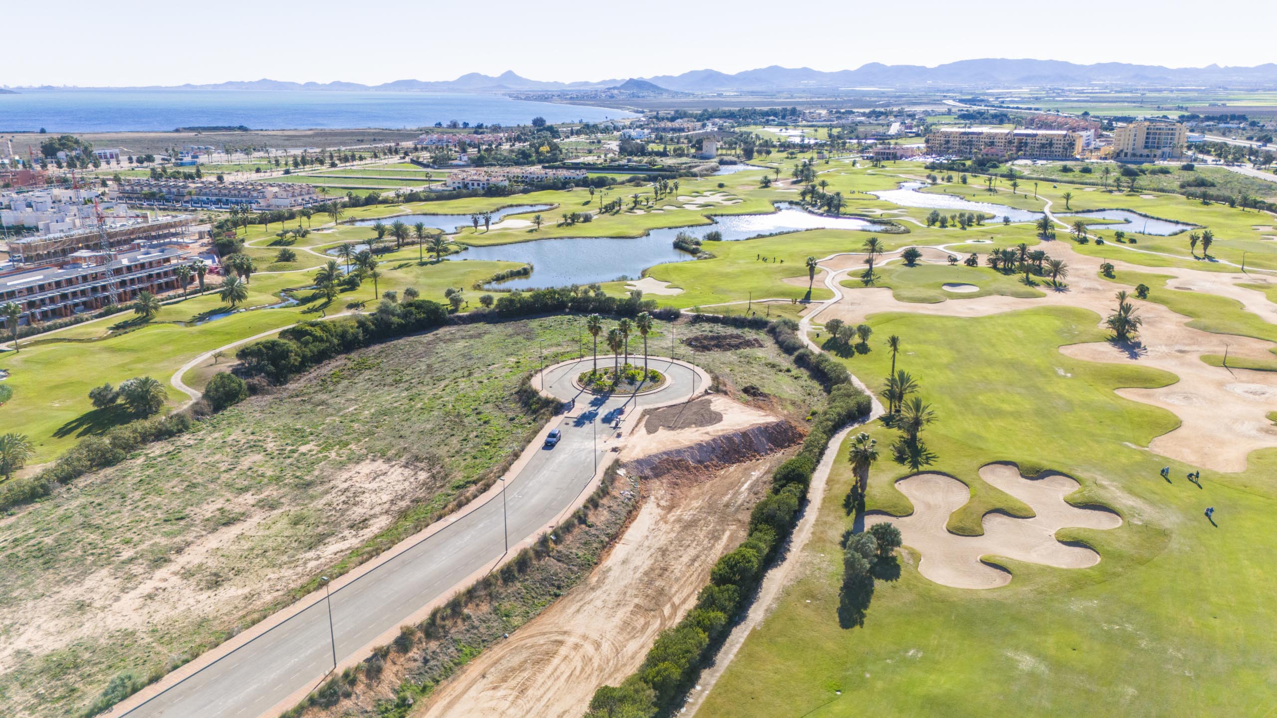 Aerial view of Apartments La Serena Golf with golf-course views by Levante Properties