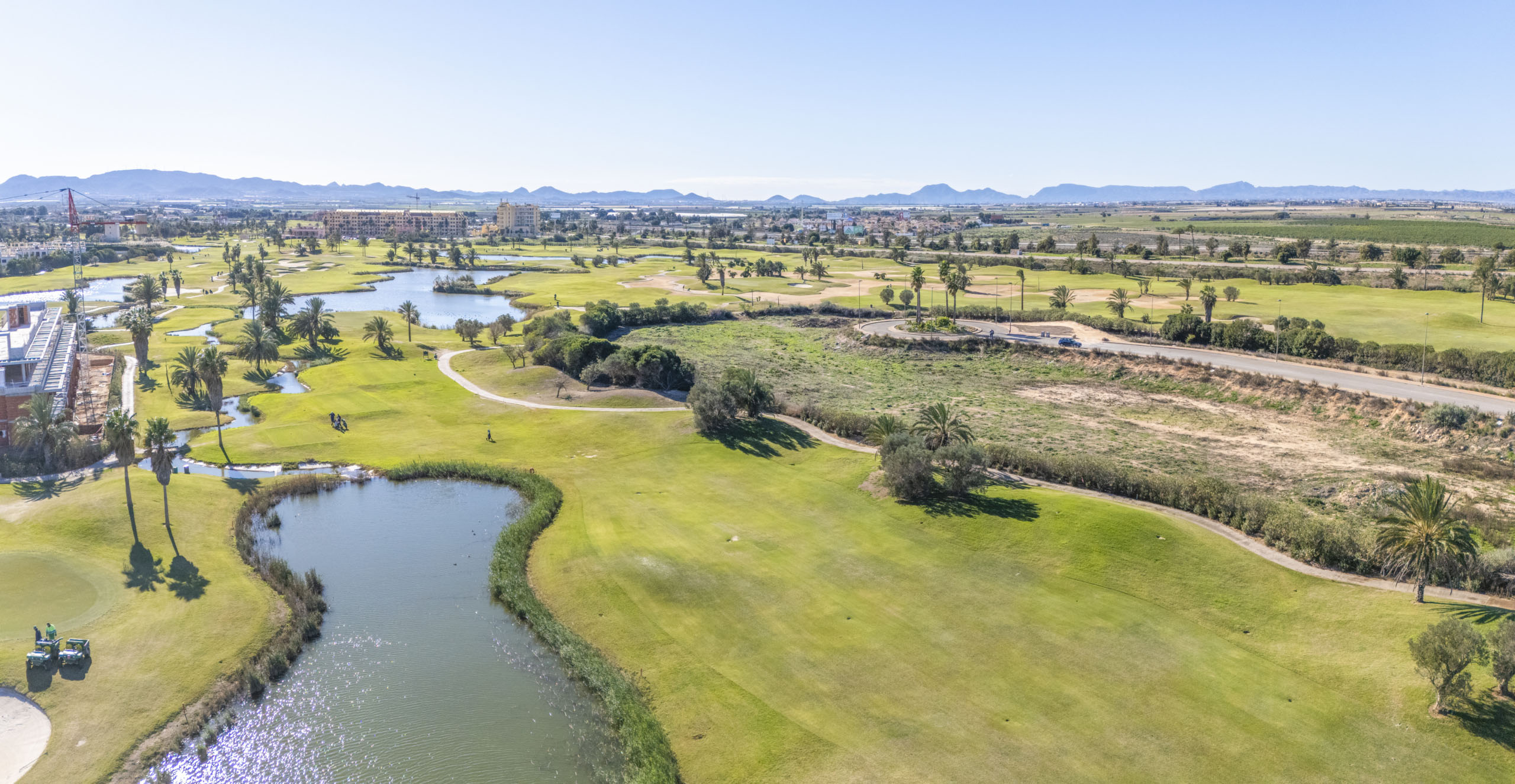 Aerial view of Apartments La Serena Golf with golf-course views by Levante Properties