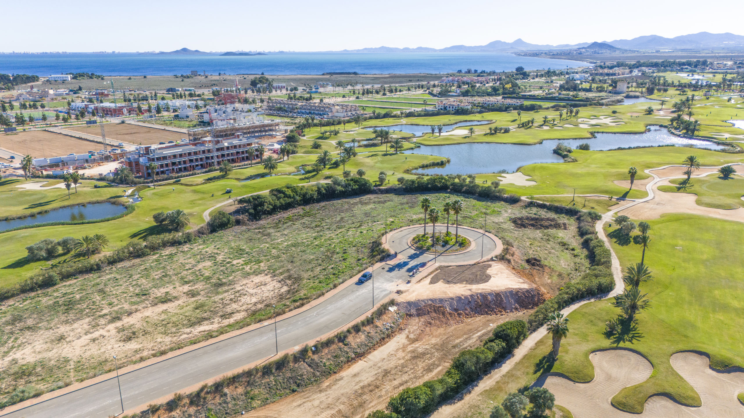 Aerial view of Apartments La Serena Golf with golf-course views by Levante Properties