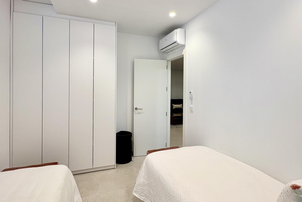 Modern bedroom in Villa Almendro at Santa Rosalía Lake & Life Resort by Levante Properties