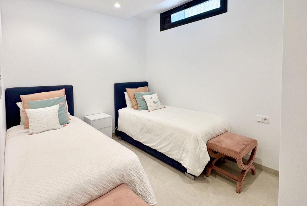 Modern bedroom in Villa Almendro at Santa Rosalía Lake & Life Resort by Levante Properties